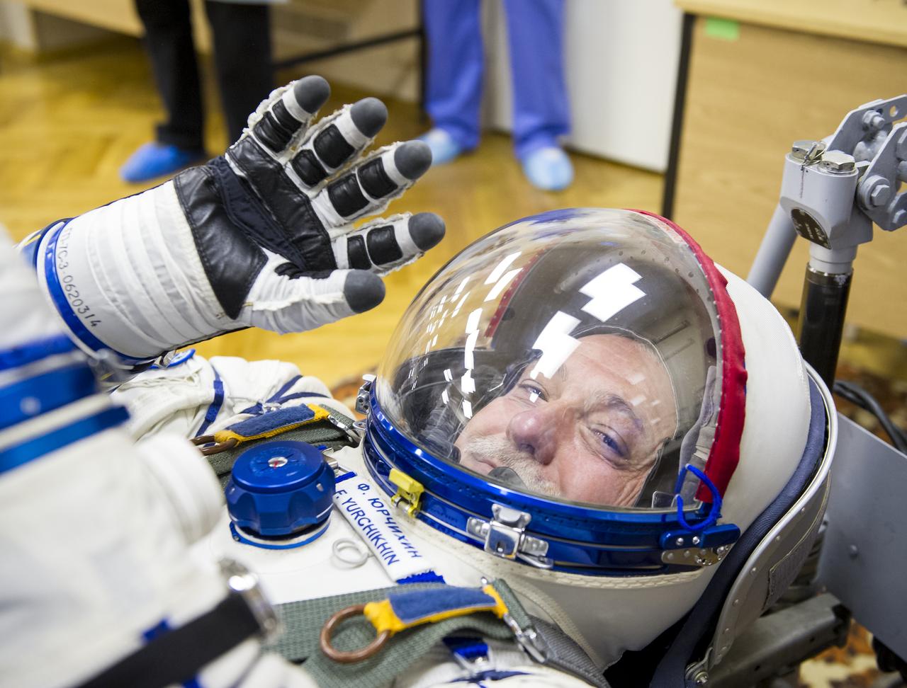 Expedition 36 NASA Soyuz Commander Fyodor Yurchikhin has his Russian Sokol suit pressure checked ahead of his launch onboard a Soyuz TMA-09M spacecraft to the International Space Station, Tuesday, May 28, 2013, at the Baikonur Cosmodrome in Kazakhstan. Launch of the Soyuz rocket will send Yurchikhin, NASA Flight Engineer Karen Nyberg and European Space Agency Flight Engineer Luca Parmitano on a five and a half-month mission aboard the International Space Station. Photo Credit: (NASA/GCTC/Andrey Shelepin)