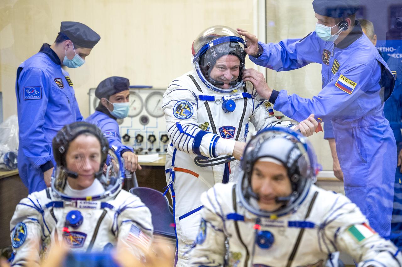 Expedition 36 NASA Soyuz Commander Fyodor Yurchikhin has his Russian Sokol suit pressure checked ahead of his launch onboard a Soyuz TMA-09M spacecraft to the International Space Station, Tuesday, May 28, 2013, at the Baikonur Cosmodrome in Kazakhstan.  Launch of the Soyuz rocket will send Yurchikhin, NASA Flight Engineer Karen Nyberg and European Space Agency Flight Engineer Luca Parmitano on a five and a half-month mission aboard the International Space Station.  Photo Credit: (NASA/Bill Ingalls)