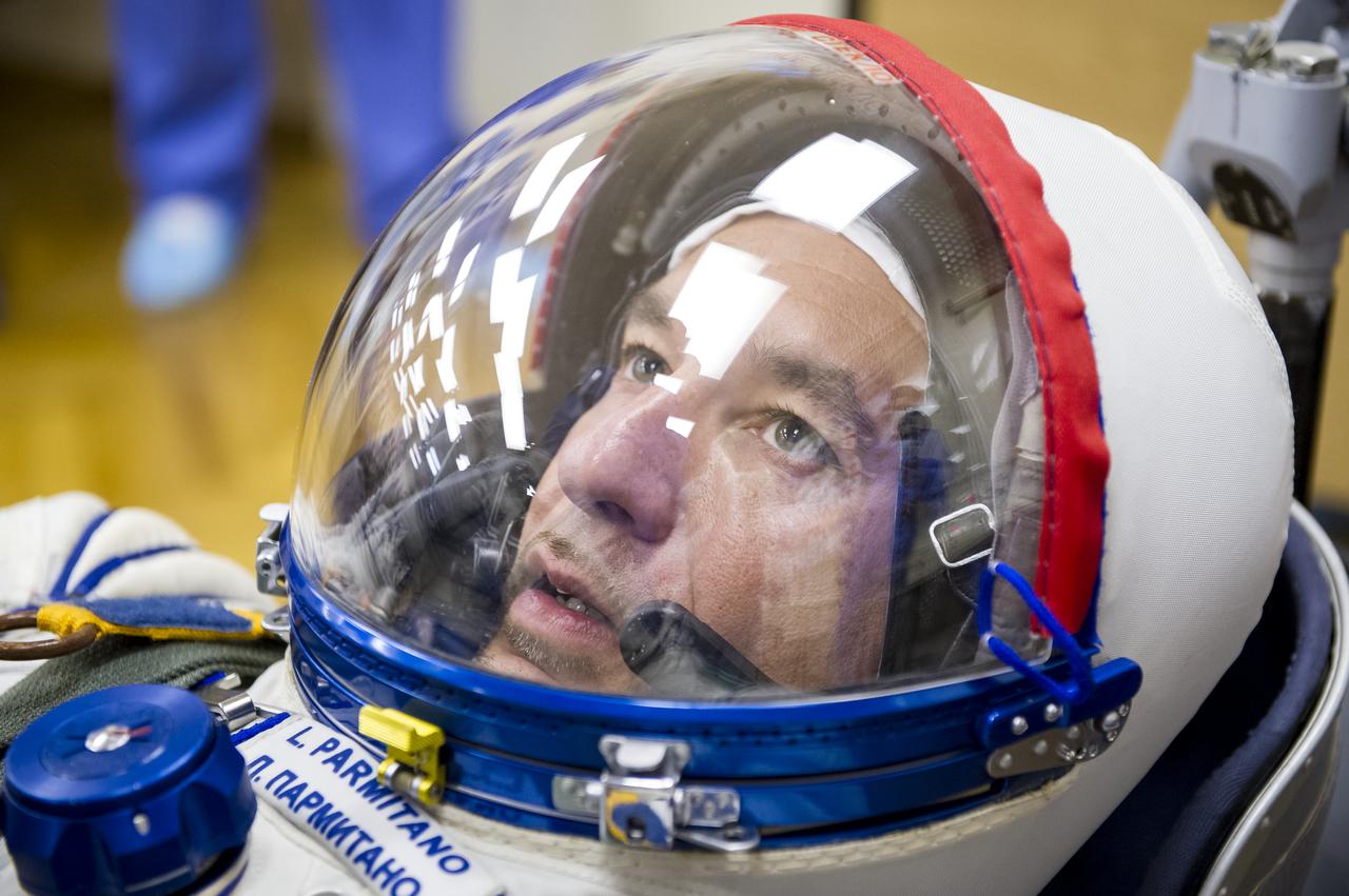 Expedition 36 European Space Agency Flight Engineer Luca Parmitano has his Russian Sokol suit pressure checked ahead of his launch onboard a Soyuz TMA-09M spacecraft to the International Space Station, Tuesday, May 28, 2013, at the Baikonur Cosmodrome in Kazakhstan. Launch of the Soyuz rocket will send Parmitano, Soyuz Commander Fyodor Yurchikhin and NASA Flight Engineer Karen Nyberg on a five and a half-month mission aboard the International Space Station. Photo Credit: (NASA/GCTC/Andrey Shelepin)