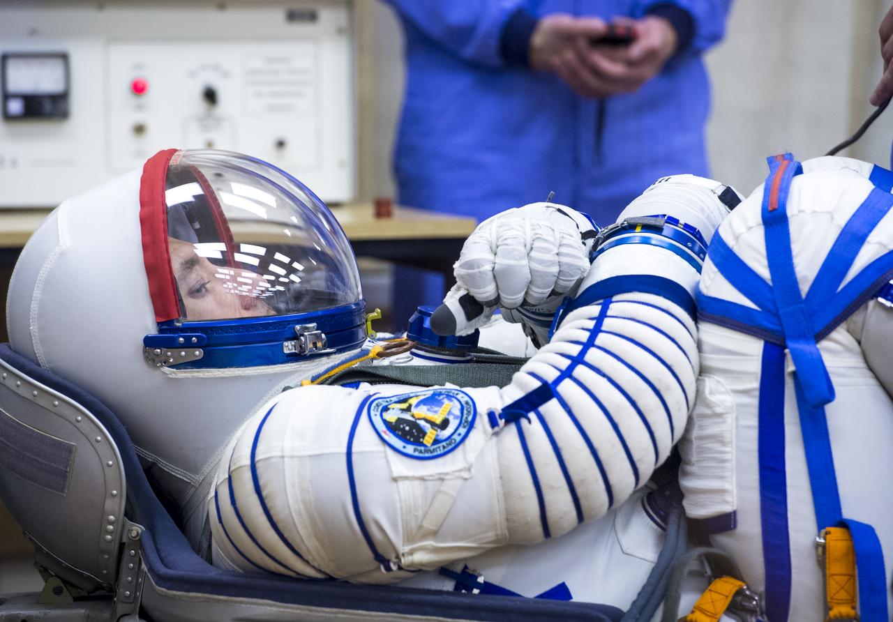 Expedition 36 European Space Agency Flight Engineer Luca Parmitano has his Russian Sokol suit pressure checked ahead of his launch onboard a Soyuz TMA-09M spacecraft to the International Space Station, Tuesday, May 28, 2013, at the Baikonur Cosmodrome in Kazakhstan. Launch of the Soyuz rocket will send Parmitano, Soyuz Commander Fyodor Yurchikhin and NASA Flight Engineer Karen Nyberg on a five and a half-month mission aboard the International Space Station. Photo Credit: (NASA/Bill Ingalls)