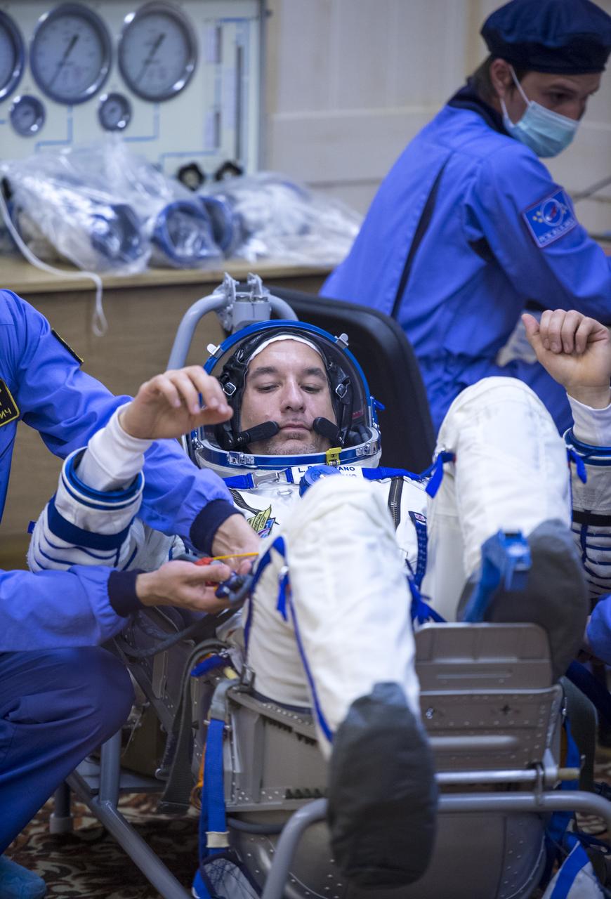 Expedition 36 European Space Agency Flight Engineer Luca Parmitano has his Russian Sokol suit pressure checked ahead of his launch onboard a Soyuz TMA-09M spacecraft to the International Space Station, Tuesday, May 28, 2013, at the Baikonur Cosmodrome in Kazakhstan. Launch of the Soyuz rocket will send Parmitano, Soyuz Commander Fyodor Yurchikhin and NASA Flight Engineer Karen Nyberg on a five and a half-month mission aboard the International Space Station. Photo Credit: (NASA/Bill Ingalls)