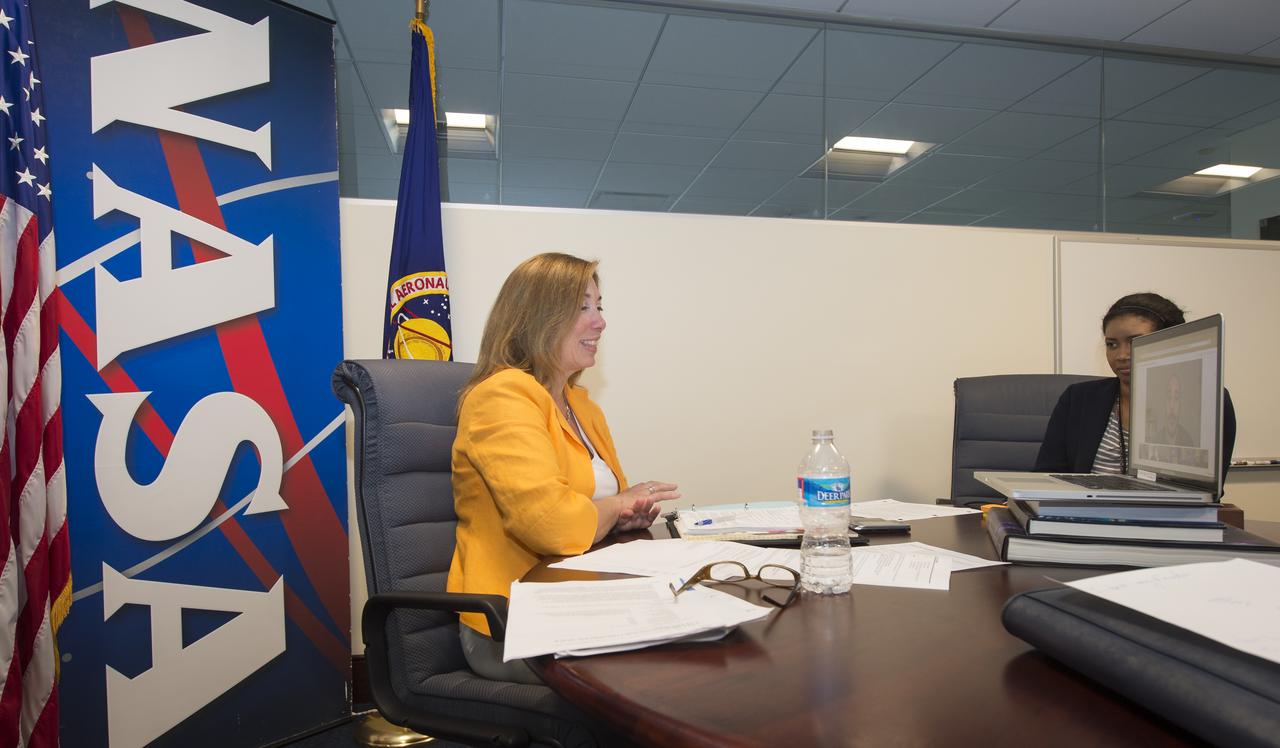 NASA Deputy Administrator Lori Garver participates in a live "We The Geeks" Google+ Hangout hosted by the White House to talk about asteroids, Friday, May 31, 2013 at NASA Headquarters in Washington.  An asteroid nearly three kilometers wide will pass by the Earth today at 3.6 million miles away.  Garver is joined in the conversation by Bill Nye, Executive Director, Planetary Society; Ed Lu, former astronaut and CEO, B612 Foundation; Peter Diamandis, Co-Founder and Co-Chairman, Planetary Resources and Jose Luis Galache, Astronomer at the International Astronomical Unions's Minor Planet Center.  Photo Credit:  (NASA/Carla Cioffi)