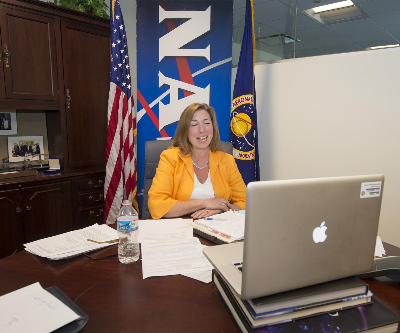 NASA Deputy Administrator Lori Garver participates in a live "We The Geeks" Google+ Hangout hosted by the White House to talk about asteroids, Friday, May 31, 2013 at NASA Headquarters in Washington.  An asteroid nearly three kilometers wide will pass by the Earth today at 3.6 million miles away.  Garver is joined in the conversation by Bill Nye, Executive Director, Planetary Society; Ed Lu, former astronaut and CEO, B612 Foundation; Peter Diamandis, Co-Founder and Co-Chairman, Planetary Resources and Jose Luis Galache, Astronomer at the International Astronomical Unions's Minor Planet Center.  Photo Credit:  (NASA/Carla Cioffi)