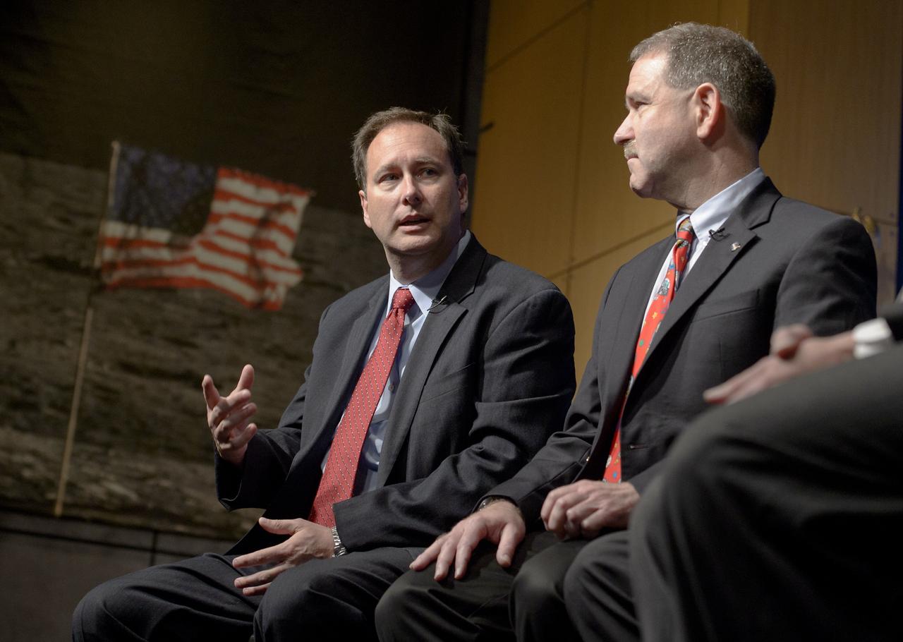 NASA Associate Administrator Robert Lightfoot, left, talks as NASA Associate Administrator Science John Grunsfeld, Ph.D, listens during the Asteroid Initiative Industry and Partner Day at NASA Headquarters on Tuesday, June 18, 2013 in Washington. During the event NASA Deputy Administrator Lori Garver and other senior NASA officials discussed the progress being made on NASA's mission to capture, redirect, and explore an asteroid. NASA also announced an Asteroid Grand Challenge focused on finding all asteroid threats to human populations and knowing what to do about them. Photo Credit: (NASA/Bill Ingalls)