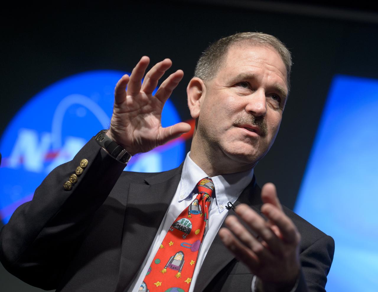 NASA Associate Administrator Science John Grunsfeld, Ph.D, talks during the Asteroid Initiative Industry and Partner Day at NASA Headquarters on Tuesday, June 18, 2013 in Washington. During the event NASA Deputy Administrator Lori Garver and other senior NASA officials discussed the progress being made on NASA's mission to capture, redirect, and explore an asteroid. NASA also announced an Asteroid Grand Challenge focused on finding all asteroid threats to human populations and knowing what to do about them. Photo Credit: (NASA/Bill Ingalls)