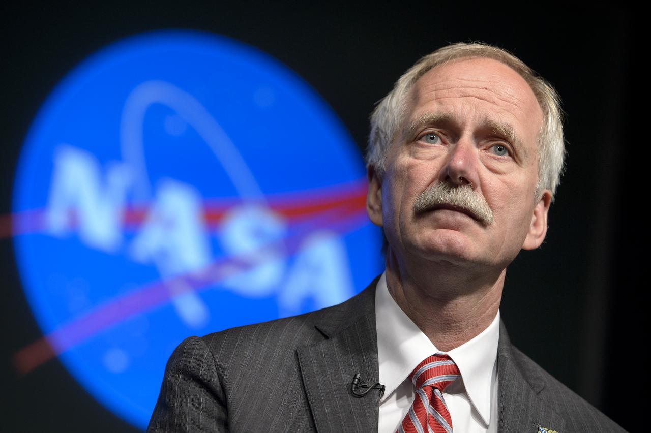 NASA Associate Administrator for Human Exploration and Operations, William Gerstenmaier, listens to a question from the audience during the Asteroid Initiative Industry and Partner Day at NASA Headquarters on Tuesday, June 18, 2013 in Washington. During the event NASA Deputy Administrator Lori Garver and other senior NASA officials discussed the progress being made on NASA's mission to capture, redirect, and explore an asteroid. NASA also announced an Asteroid Grand Challenge focused on finding all asteroid threats to human populations and knowing what to do about them. Photo Credit: (NASA/Bill Ingalls)