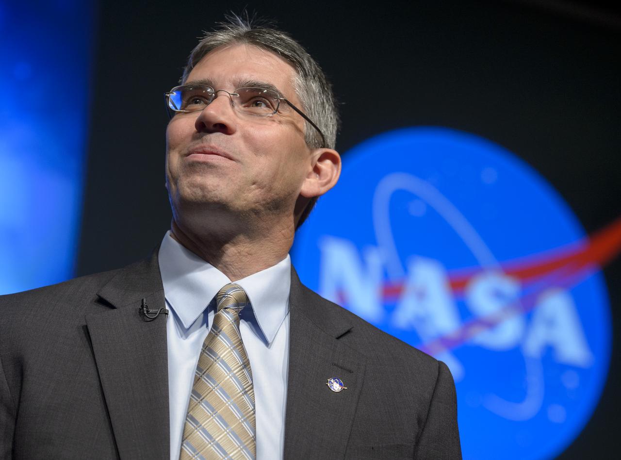 NASA Associate Administrator for Space Technology, Mike Gazarik, Ph.D, listens to a question from the audience during the Asteroid Initiative Industry and Partner Day at NASA Headquarters on Tuesday, June 18, 2013 in Washington. During the event NASA Deputy Administrator Lori Garver and other senior NASA officials discussed the progress being made on NASA's mission to capture, redirect, and explore an asteroid. NASA also announced an Asteroid Grand Challenge focused on finding all asteroid threats to human populations and knowing what to do about them. Photo Credit: (NASA/Bill Ingalls)