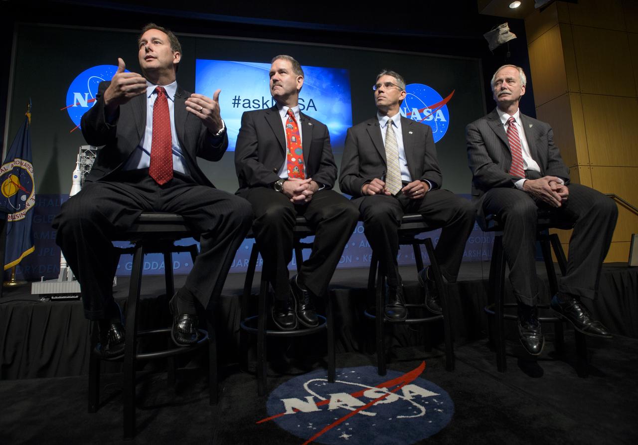 NASA Associate Administrator Robert Lightfoot, left, talks as NASA Associate Administrator Science John Grunsfeld, Ph.D, second from left, NASA Associate Administrator for Space Technology, Mike Gazarik, Ph.D, and, NASA Associate Administrator for Human Exploration and Operations, William Gerstenmaier, right, look on during the Asteroid Initiative Industry and Partner Day at NASA Headquarters on Tuesday, June 18, 2013 in Washington. During the event NASA Deputy Administrator Lori Garver and other senior NASA officials discussed the progress being made on NASA's mission to capture, redirect, and explore an asteroid. NASA also announced an Asteroid Grand Challenge focused on finding all asteroid threats to human populations and knowing what to do about them. Photo Credit: (NASA/Bill Ingalls)