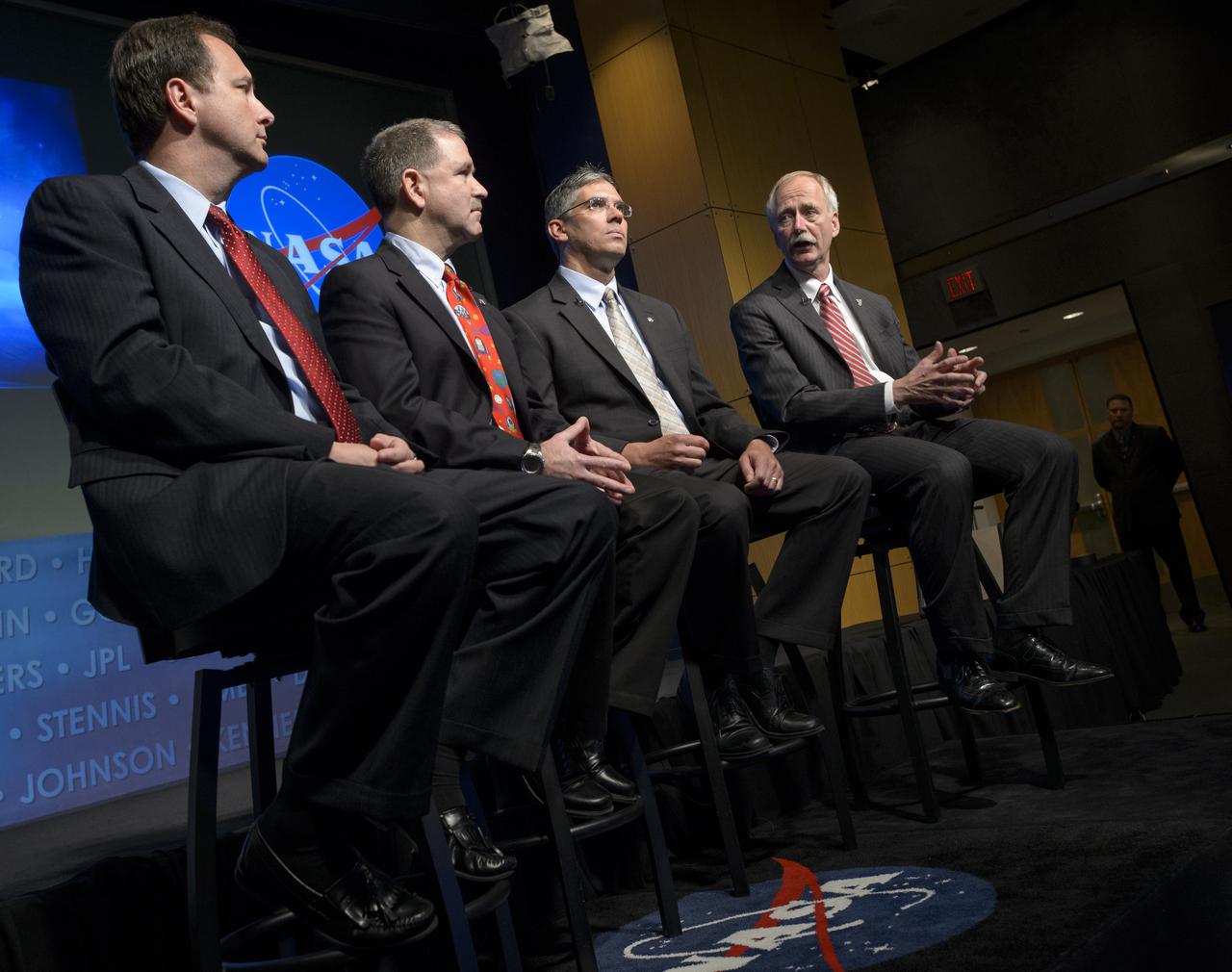 NASA Associate Administrator for Human Exploration and Operations, William Gerstenmaier, right, talks as NASA Associate Administrator Robert Lightfoot, left, NASA Associate Administrator Science John Grunsfeld, Ph.D, second from left, and NASA Associate Administrator for Space Technology, Mike Gazarik, Ph.D, look on during the Asteroid Initiative Industry and Partner Day at NASA Headquarters on Tuesday, June 18, 2013 in Washington. During the event NASA Deputy Administrator Lori Garver and other senior NASA officials discussed the progress being made on NASA's mission to capture, redirect, and explore an asteroid. NASA also announced an Asteroid Grand Challenge focused on finding all asteroid threats to human populations and knowing what to do about them. Photo Credit: (NASA/Bill Ingalls)