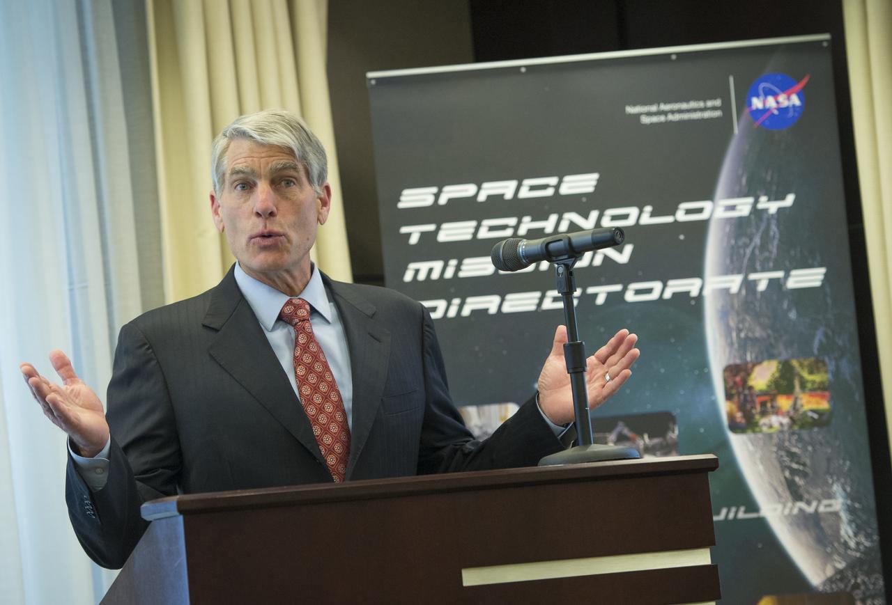 U.S. Senator Mark Udall (D-CO) speaks at a Green Propellant Infusion Mission press conference at the Reserve Officers Association, Tuesday, July 9, 2013 in Washington.  The NASA GPIM program, led by Ball Aerospace in conjunction with Aerojet Rocketdyne, is demonstrating a high-performance "green" fuel in space.  The propellant used on this mission offers nearly 50 percent better performance when compared to traditional hydrazine.  Photo Credit: (NASA/Carla Cioffi)