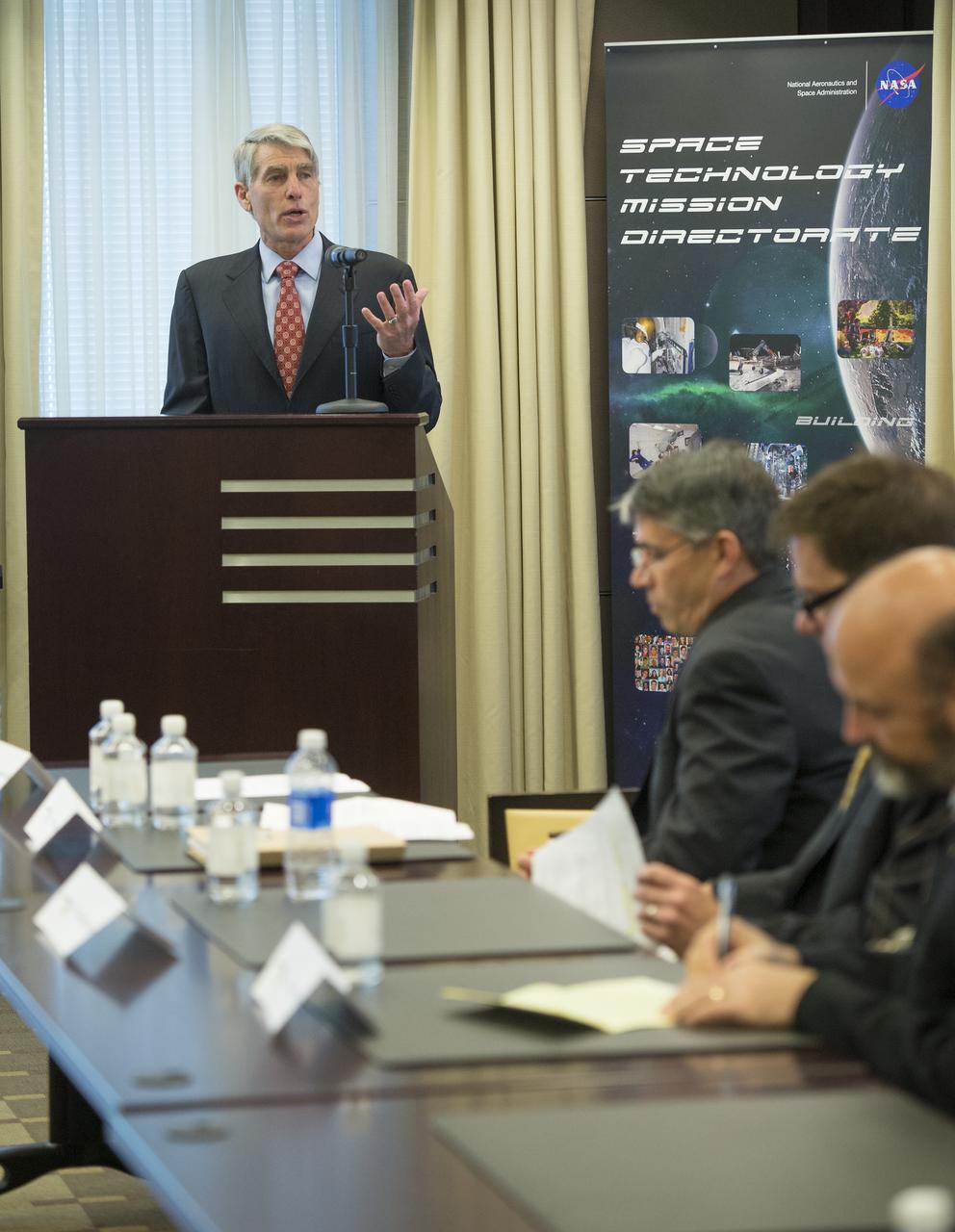 U.S. Senator Mark Udall (D-CO) speaks at a Green Propellant Infusion Mission press conference at the Reserve Officers Association, Tuesday, July 9, 2013 in Washington.  The NASA GPIM program, led by Ball Aerospace in conjunction with Aerojet Rocketdyne, is demonstrating a high-performance "green" fuel in space.  The propellant used on this mission offers nearly 50 percent better performance when compared to traditional hydrazine.  Photo Credit: (NASA/Carla Cioffi)