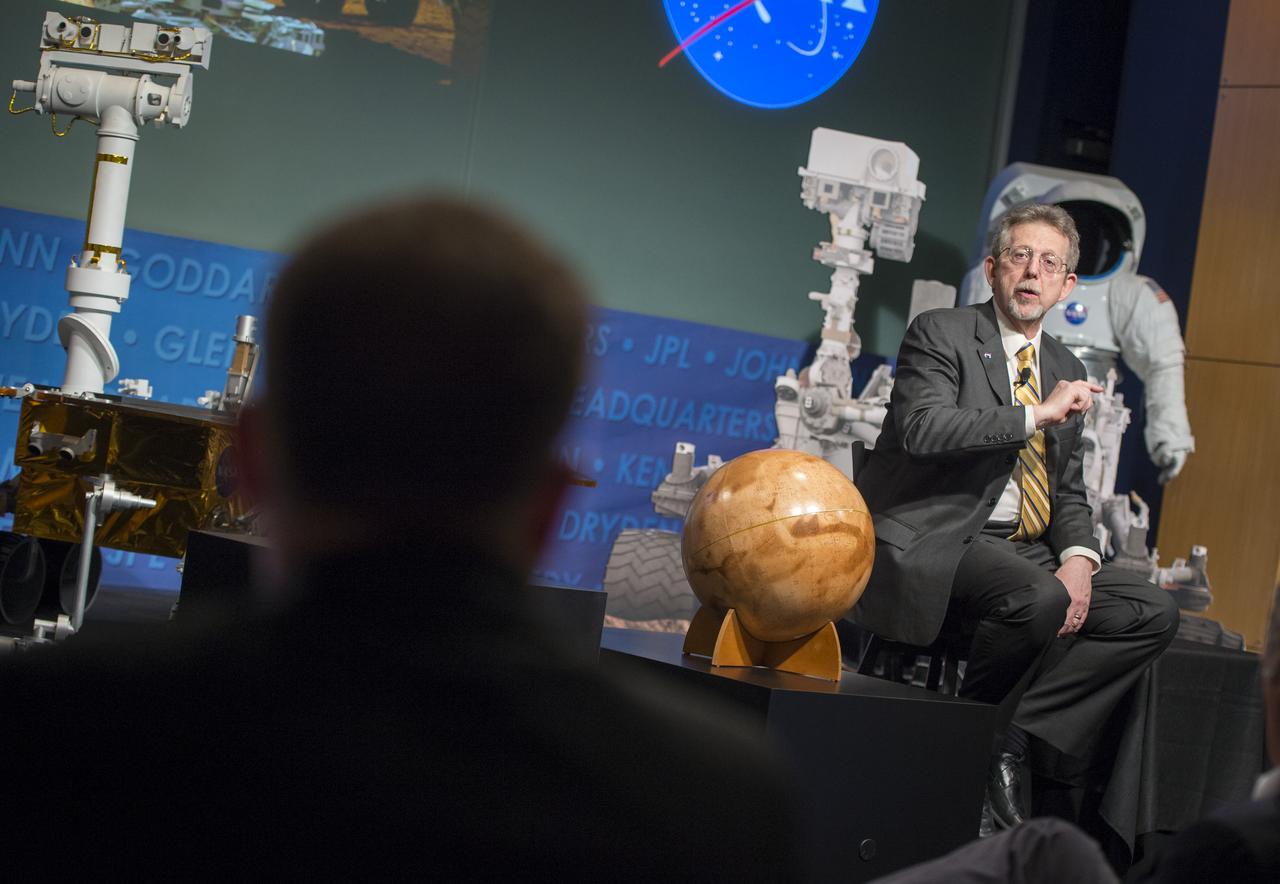 Jim Green, director, Planetary Division, NASA's Science Mission Directorate, answers a question at a public event at NASA Headquarters observing the first anniversary of the Curiosity rover's landing on Mars, Tuesday, August 6th, 2013 in Washington.  The Mars Science Laboratory mission successfully placed the one-ton Curiosity rover on the surface of Mars on Aug. 6, 2012, about 1 mile from the center of its 12-mile-long target area.  Within the first eight months of a planned 23-months primary mission, Curiosity met its major science objective of finding evidence of a past environment well-suited to support microbial life.  Photo Credit: (NASA/Carla Cioffi)