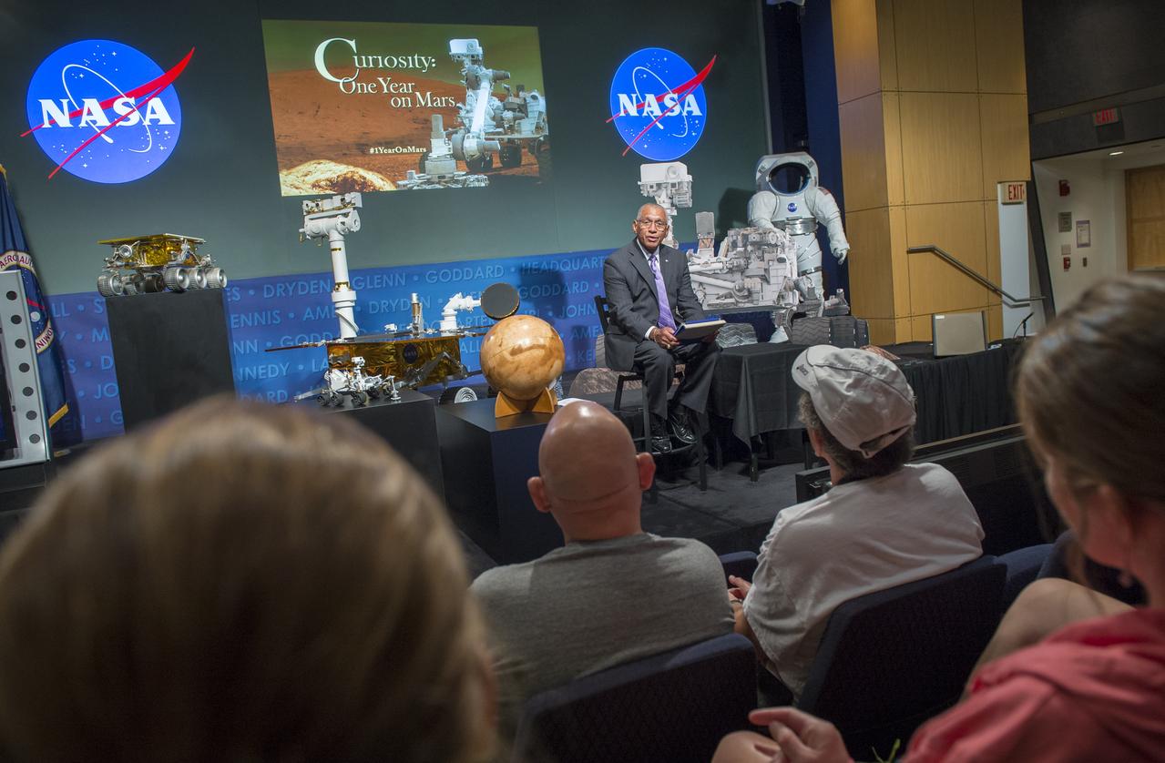 NASA Administrator Charles Bolden speaks at a public event at NASA Headquarters observing the first anniversary of the Curiosity rover's landing on Mars, Tuesday, August 6th, 2013 in Washington.  The Mars Science Laboratory mission successfully placed the one-ton Curiosity rover on the surface of Mars on Aug. 6, 2012, about 1 mile from the center of its 12-mile-long target area.  Within the first eight months of a planned 23-months primary mission, Curiosity met its major science objective of finding evidence of a past environment well-suited to support microbial life.  Photo Credit: (NASA/Carla Cioffi)