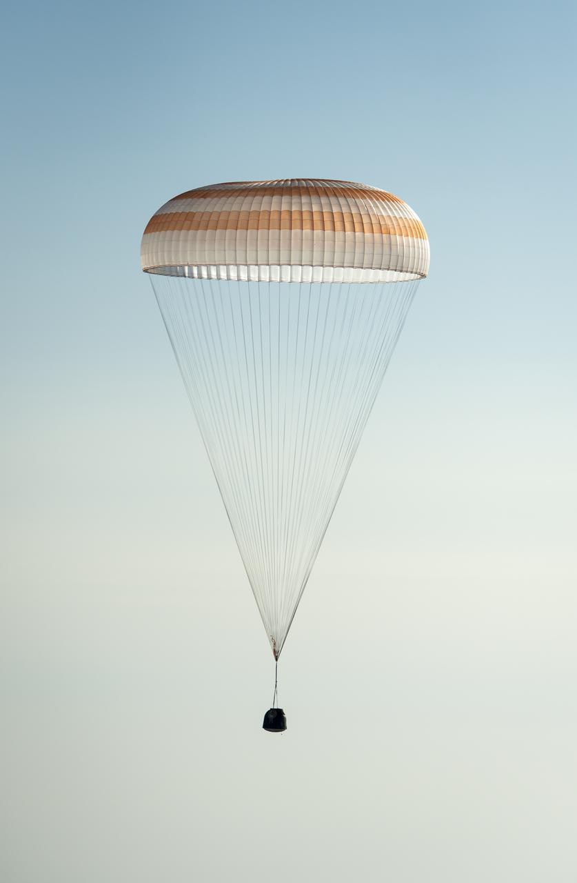 The Soyuz TMA-08M spacecraft with Expedition 36 Commander Pavel Vinogradov of the Russian Federal Space Agency (Roscosmos), Flight Engineer Alexander Misurkin of Roscosmos and Flight Engineer Chris Cassidy of NASA aboard, is seen as it lands in a remote area near the town of Zhezkazgan, Kazakhstan, on Wednesday, Sept. 11, 2013. Vinogradov, Misurkin and Cassidy returned to Earth after five and a half months on the International Space Station. Photo Credit: (NASA/Bill Ingalls)
