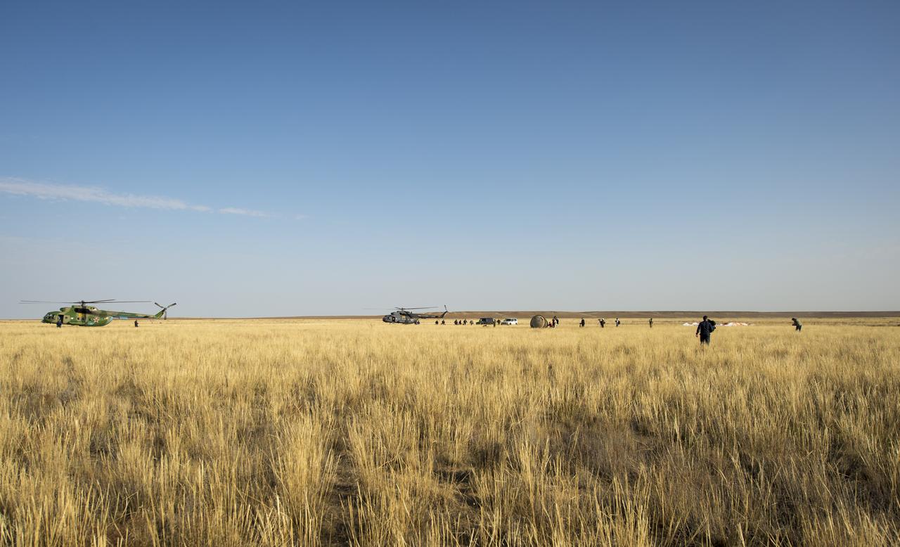 Russian search and rescue personnel arrive within seconds after the landing of the Soyuz TMA-08M spacecraft with Expedition 36 Commander Pavel Vinogradov of the Russian Federal Space Agency (Roscosmos), Flight Engineer Alexander Misurkin of Roscosmos and Flight Engineer Chris Cassidy of NASA aboard, in a remote area near the town of Zhezkazgan, Kazakhstan, on Wednesday, Sept. 11, 2013. Vinogradov, Misurkin and Cassidy returned to Earth after five and a half months on the International Space Station. Photo Credit: (NASA/Bill Ingalls)
