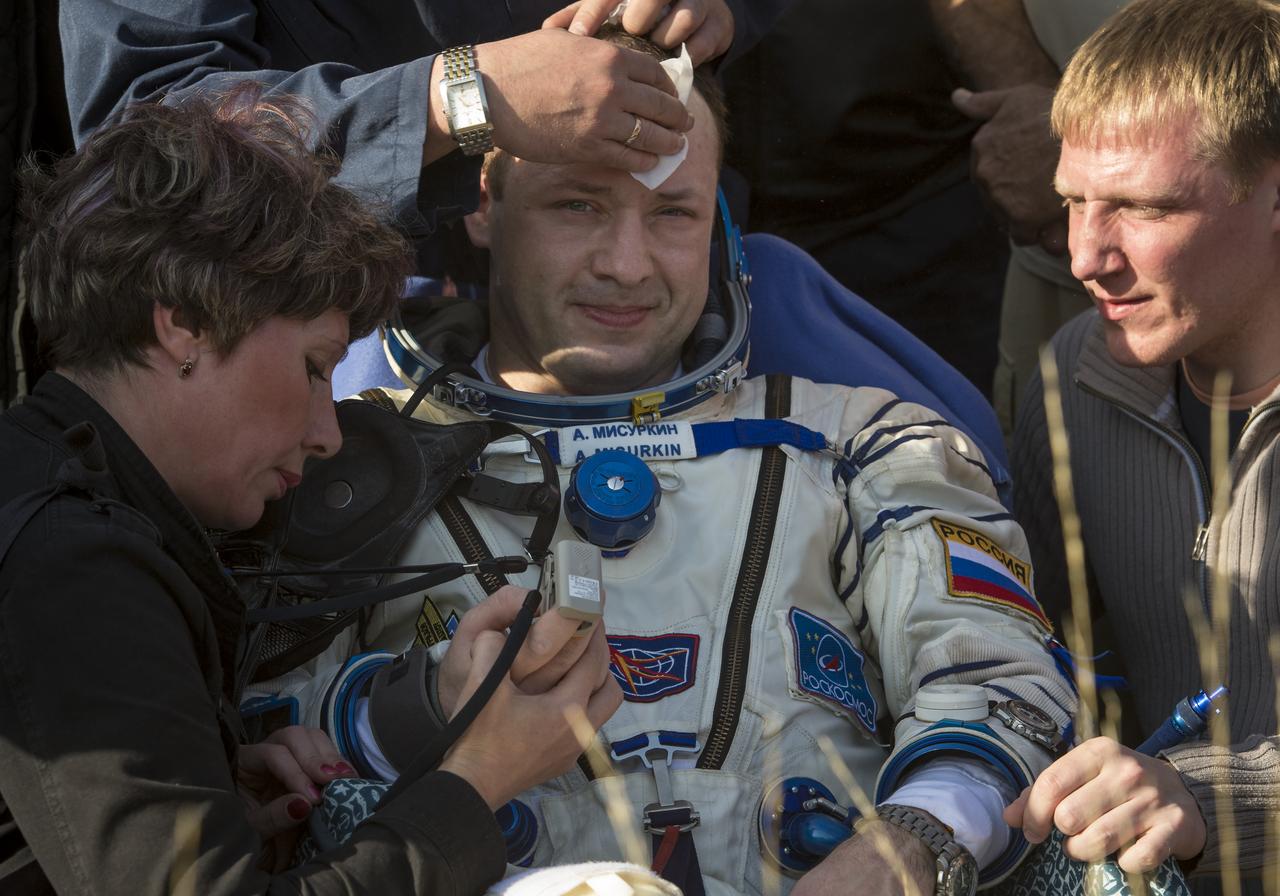Expedition 36 Flight Engineer Alexander Misurkin of the Russian Federal Space Agency (Roscosmos) rest in a chair after he and, Commander Pavel Vinogradov of Roscosmos, and Flight Engineer Chris Cassidy of NASA landed their Soyuz TMA-08M capsule in a remote area near the town of Zhezkazgan, Kazakhstan, on Wednesday, Sept. 11, 2013. Vinogradov, Misurkin and Cassidy returned to Earth after five and a half months on the International Space Station. Photo Credit: (NASA/Bill Ingalls)