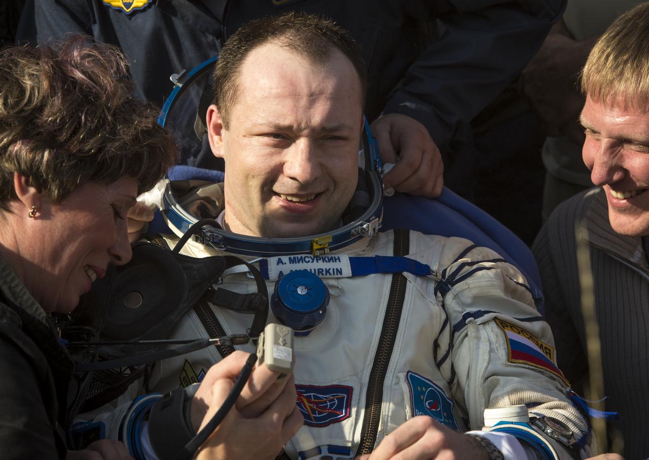 Expedition 36 Flight Engineer Alexander Misurkin of the Russian Federal Space Agency (Roscosmos) rest in a chair after he and, Commander Pavel Vinogradov of Roscosmos, and Flight Engineer Chris Cassidy of NASA landed their Soyuz TMA-08M capsule in a remote area near the town of Zhezkazgan, Kazakhstan, on Wednesday, Sept. 11, 2013. Vinogradov, Misurkin and Cassidy returned to Earth after five and a half months on the International Space Station. Photo Credit: (NASA/Bill Ingalls)