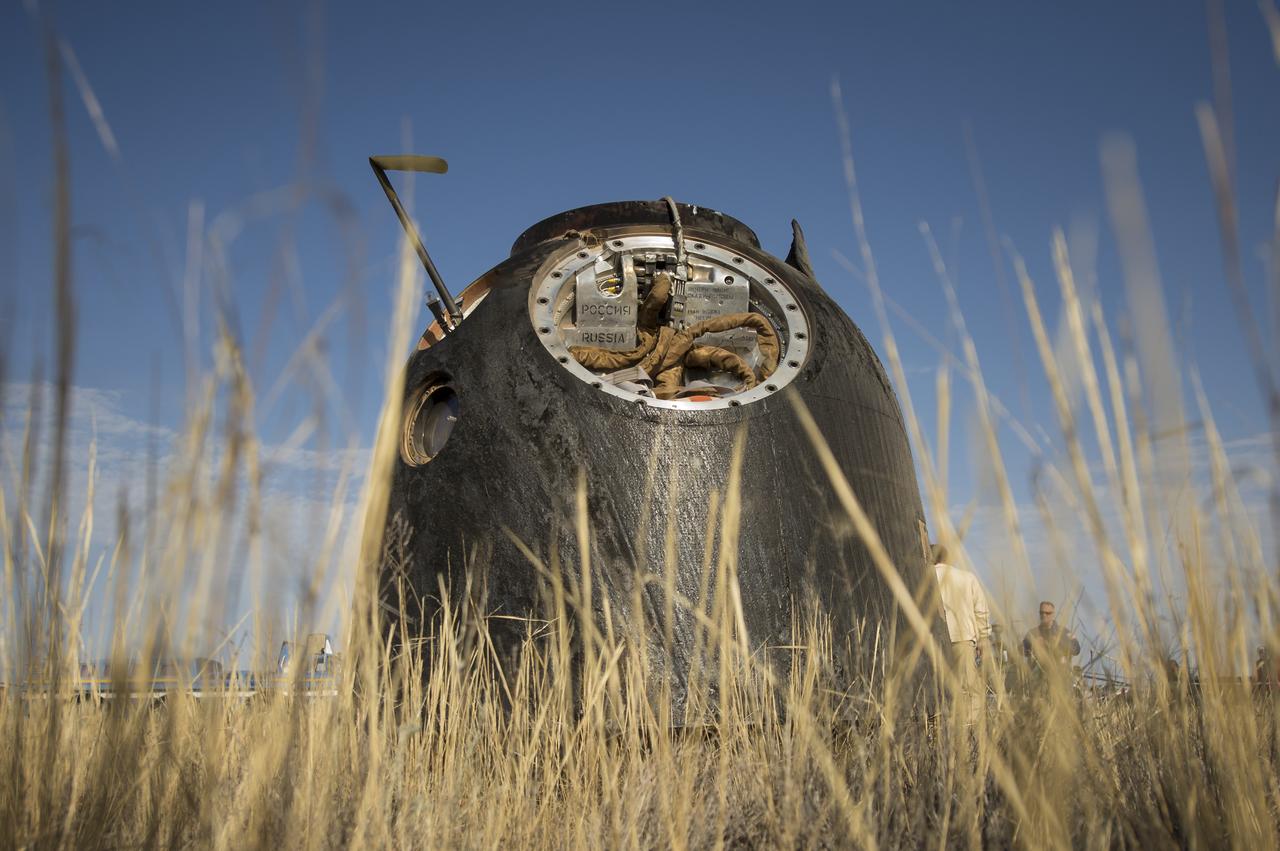 The Soyuz TMA-08M spacecraft is seen after it landed with Expedition 36 Commander Pavel Vinogradov of the Russian Federal Space Agency (Roscosmos), Flight Engineer Alexander Misurkin of Roscosmos and Flight Engineer Chris Cassidy of NASA aboard, in a remote area near the town of Zhezkazgan, Kazakhstan, on Wednesday, Sept. 11, 2013. Vinogradov, Misurkin and Cassidy returned to Earth after five and a half months on the International Space Station. Photo Credit: (NASA/Bill Ingalls)