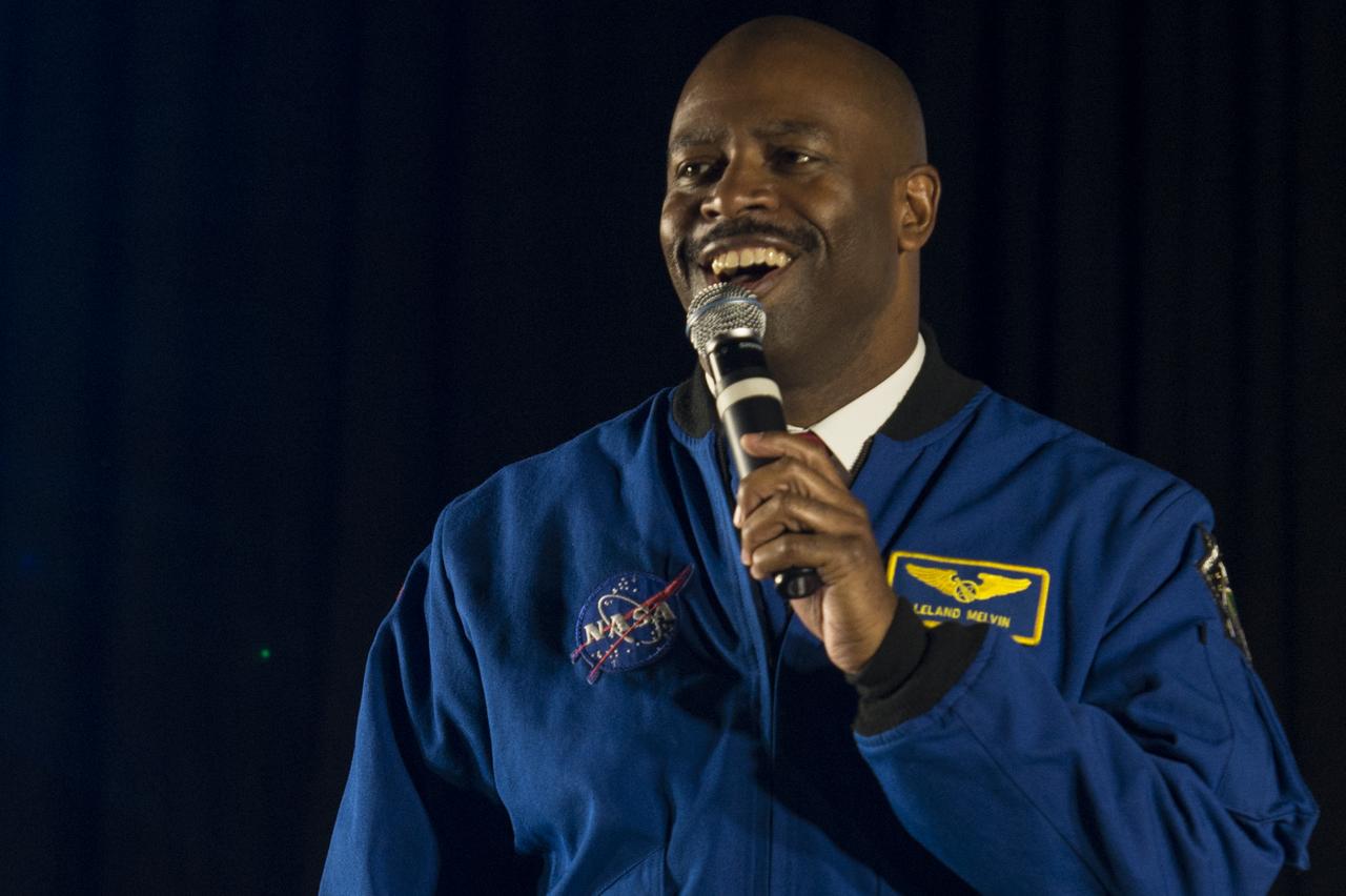 Leland Melvin, NASA Associate Administrator for Education and former 2x astronaut, addresses students before the start of "FMA Live!" at Hardy Middle School in Washington on Monday, Sept. 16th, 2013. "FMA Live!" is a program sponsored by NASA and Honeywell that teaches Newton's three laws of motion mixed with dance and music. The program travels across the country and has reached nearly 300,000 students.Photo Credit: (NASA/Jay Westcott)