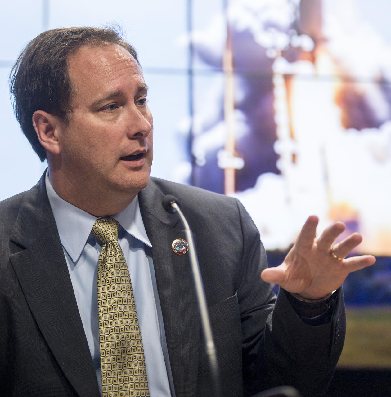 Robert Lightfoot, associate administrator, NASA, talks during a press conference held after the successful launch of the Antares rocket, with the Cygnus cargo spacecraft aboard, Wednesday, Sept. 18, 2013, NASA Wallops Flight Facility, Virginia. Cygnus is on its way to rendezvous with the space station. The spacecraft will deliver about 1,300 pounds (589 kilograms) of cargo, including food and clothing, to the Expedition 37 crew. Photo Credit: (NASA/Bill Ingalls)