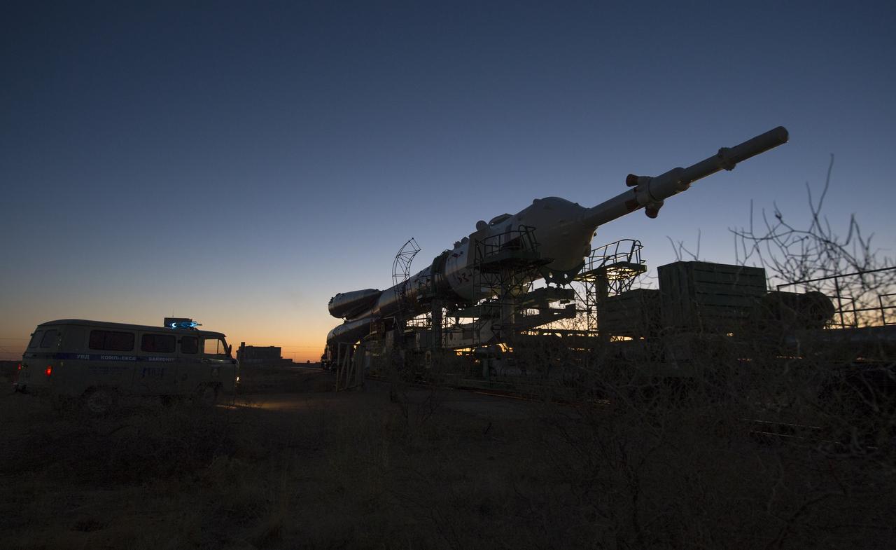 The Soyuz rocket is rolled out to the launch pad by train on Monday, Sept. 23, 2013, at the Baikonur Cosmodrome in Kazakhstan. Launch of the Soyuz rocket is scheduled for September 26 and will send Expedition 37 Soyuz Commander Oleg Kotov, NASA Flight Engineer Michael Hopkins and Russian Flight Engineer Sergei Ryazansky on a five and a half-month mission aboard the International Space Station.  Photo Credit: (NASA/Carla Cioffi)