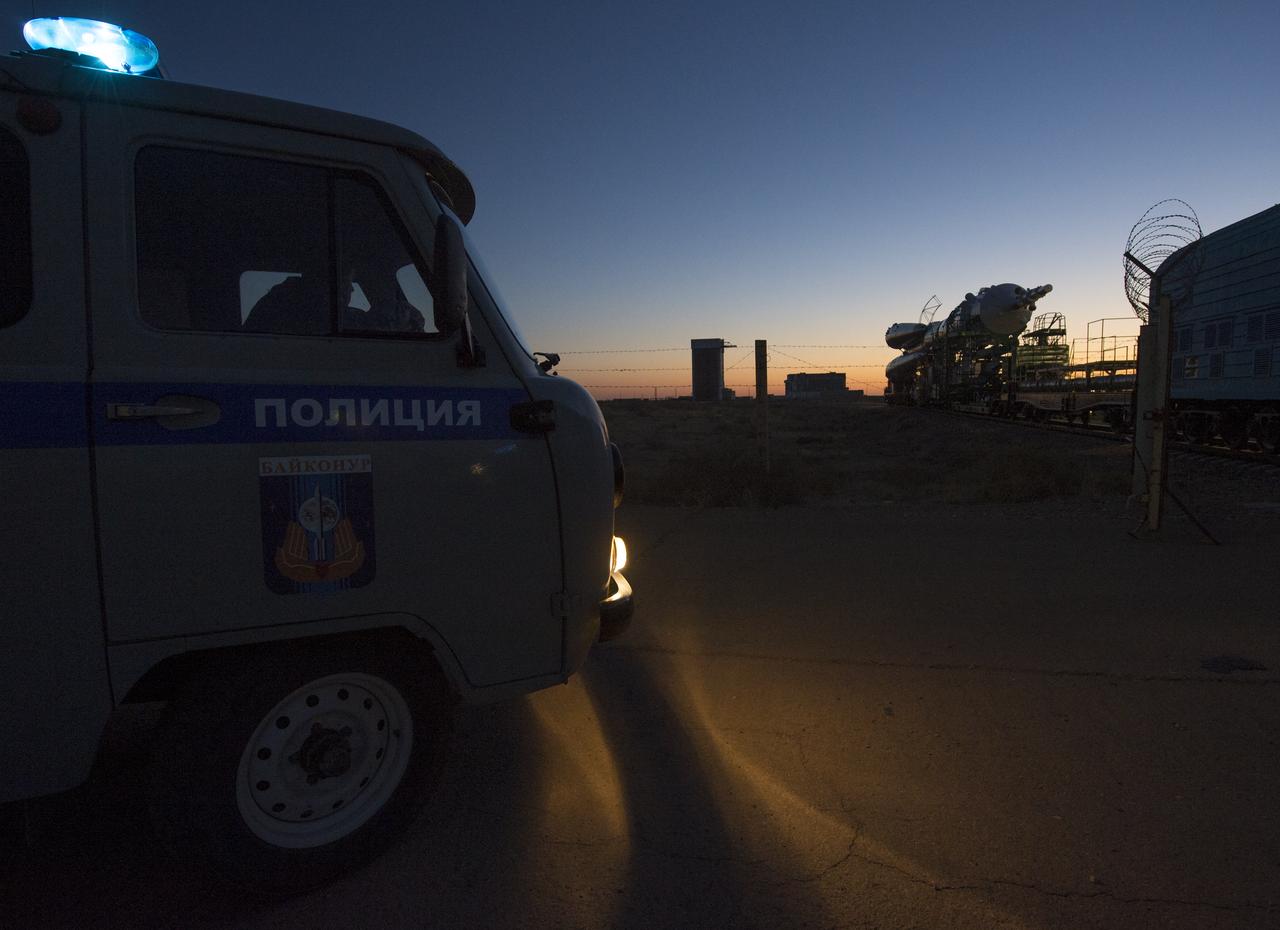 The Soyuz rocket is rolled out to the launch pad by train on Monday, Sept. 23, 2013, at the Baikonur Cosmodrome in Kazakhstan. Launch of the Soyuz rocket is scheduled for September 26 and will send Expedition 37 Soyuz Commander Oleg Kotov, NASA Flight Engineer Michael Hopkins and Russian Flight Engineer Sergei Ryazansky on a five and a half-month mission aboard the International Space Station.  Photo Credit: (NASA/Carla Cioffi)