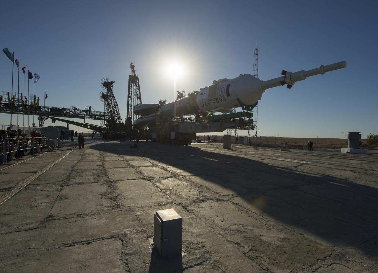 The Soyuz rocket is seen on its launch pad shortly before being lifted into its upright position on Monday, Sept. 23, 2013, at the Baikonur Cosmodrome in Kazakhstan. Launch of the Soyuz rocket is scheduled for September 26 and will send Expedition 37 Soyuz Commander Oleg Kotov, NASA Flight Engineer Michael Hopkins and Russian Flight Engineer Sergei Ryazansky on a five and a half-month mission aboard the International Space Station.  Photo Credit: (NASA/Carla Cioffi)
