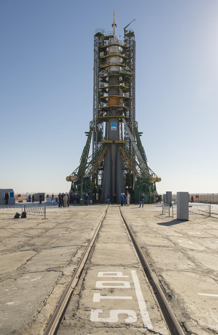 The Soyuz rocket is seen on its launch pad shortly after being lifted into its upright position on Monday, Sept. 23, 2013, at the Baikonur Cosmodrome in Kazakhstan. Launch of the Soyuz rocket is scheduled for September 26 and will send Expedition 37 Soyuz Commander Oleg Kotov, NASA Flight Engineer Michael Hopkins and Russian Flight Engineer Sergei Ryazansky on a five and a half-month mission aboard the International Space Station.  Photo Credit: (NASA/Carla Cioffi)