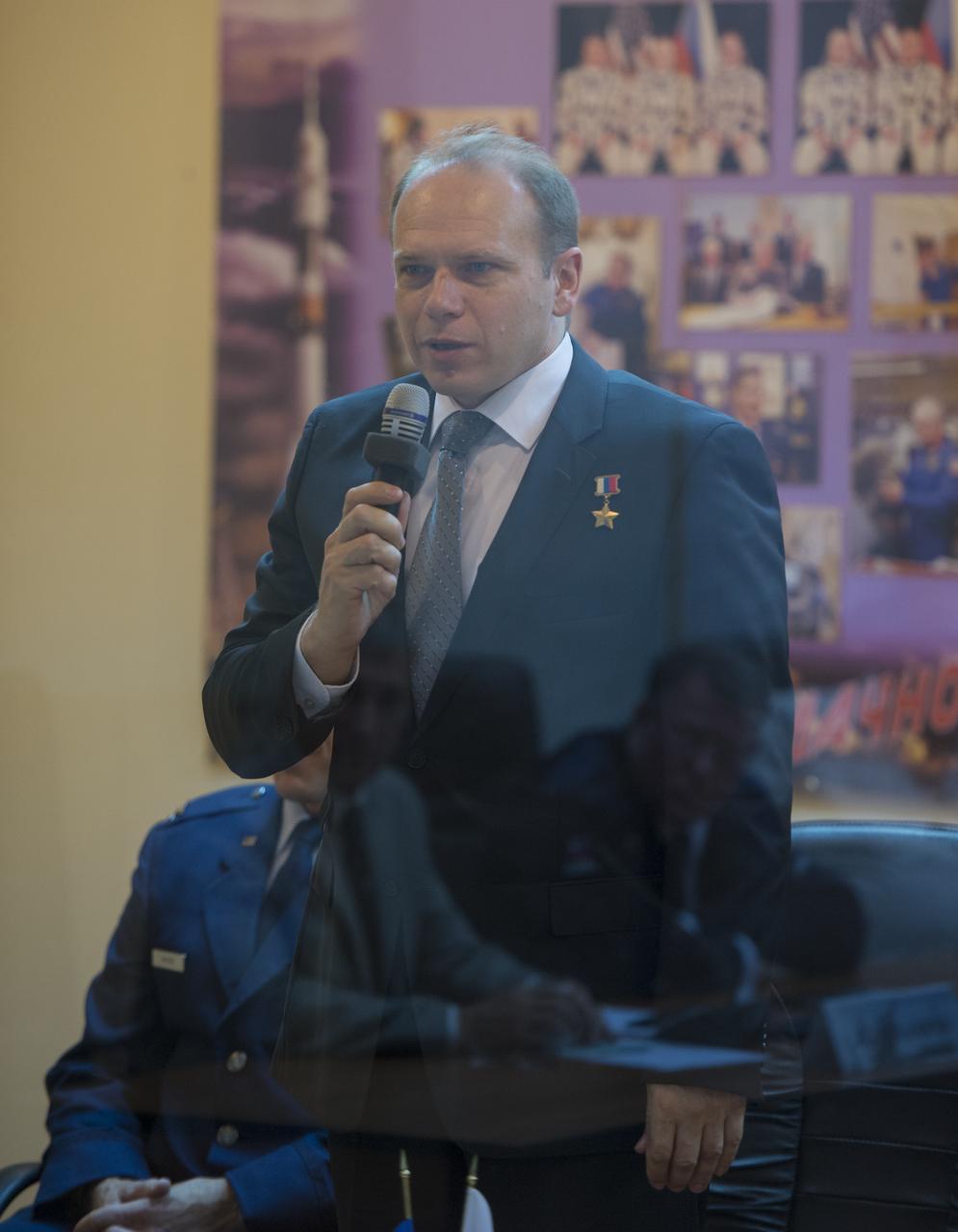 Expedition 37 Soyuz Commander Oleg Kotov of the Russian Federal Space Agency (Roscosmos) talks during the State Commission meeting at the Cosmonaut Hotel, Tuesday, Sept. 24, 2013, in Kazakhstan. Launch of the Soyuz rocket is scheduled for September 26 and will send Kotov, NASA Flight Engineer Michael Hopkins and Russian Flight Engineer Sergei Ryazansky on a five and a half-month mission aboard the International Space Station.  Photo Credit: (NASA/Carla Cioffi)