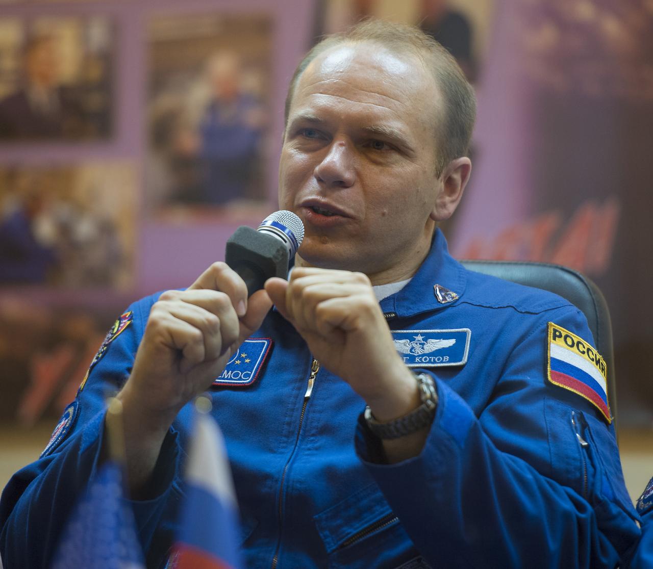 Expedition 37 Soyuz Commander Oleg Kotov anwers  a reporter’s question at a press conference held at the Cosmonaut Hotel, on Tuesday, Sept. 24, 2013, in Baikonur, Kazakhstan. Launch of the Soyuz rocket is scheduled for September 26 and will send Kotov, NASA Flight Engineer Michael Hopkins and Russian Flight Engineer Sergei Ryazansky on a five and a half-month mission aboard the International Space Station.  Photo Credit: (NASA/Carla Cioffi)