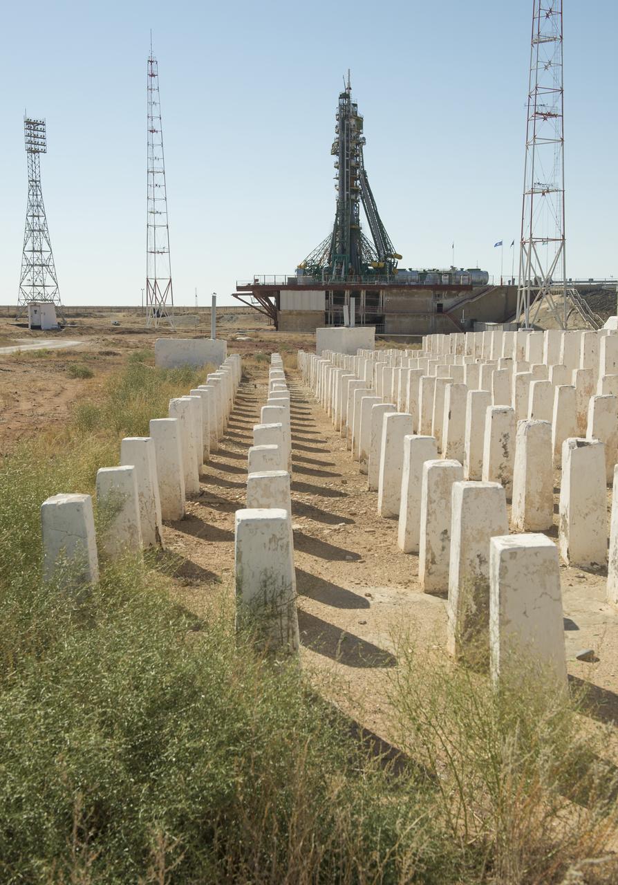 The Soyuz rocket is seen on its launch hours before its scheduled launch to the International Space Station, Wednesday, Sept. 25, 2013, at the Baikonur Cosmodrome in Kazakhstan. Launch of the Soyuz rocket is scheduled for September 26 and will send Expedition 37 Soyuz Commander Oleg Kotov, NASA Flight Engineer Michael Hopkins and Russian Flight Engineer Sergei Ryazansky on a five and a half-month mission aboard the International Space Station. Photo Credit: (NASA/Carla Cioffi)