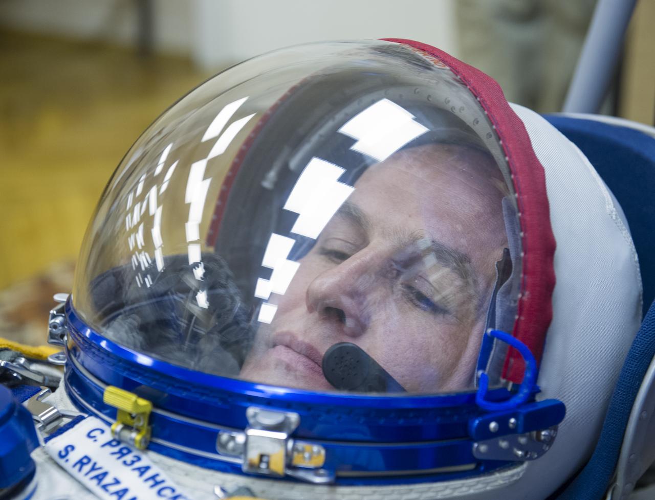 Expedition 37/38 Russian Flight Engineer Sergey Ryazanskiy has his Russian Sokol suit pressure checked ahead of his launch onboard a Soyuz TMA-10M spacecraft to the International Space Station with fellow crewmates NASA Flight Engineer Michael Hopkins and Soyuz Commander Oleg Kotov, on Wednesday, Sept. 25, 2013, in Baikonur, Kazakhstan. Launch of the Soyuz rocket will send the crewmates on a five-month mission aboard the International Space Station.  Photo Credit: (NASA/GCTC/Andrey Shelepin)