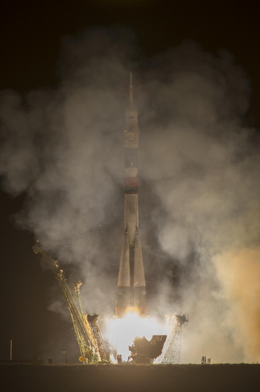 The Soyuz TMA-10M rocket launches from the Baikonur Cosmodrome in Kazakhstan on Thursday, Sept. 26, 2013 carrying Expedition 37 Soyuz Commander Oleg Kotov, NASA Flight Engineer Michael Hopkins and Russian Flight Engineer Sergei Ryazansky to the International Space Station. Their Soyuz rocket launched at 2:58 a.m. local time. Photo Credit: (NASA/Carla Cioffi)