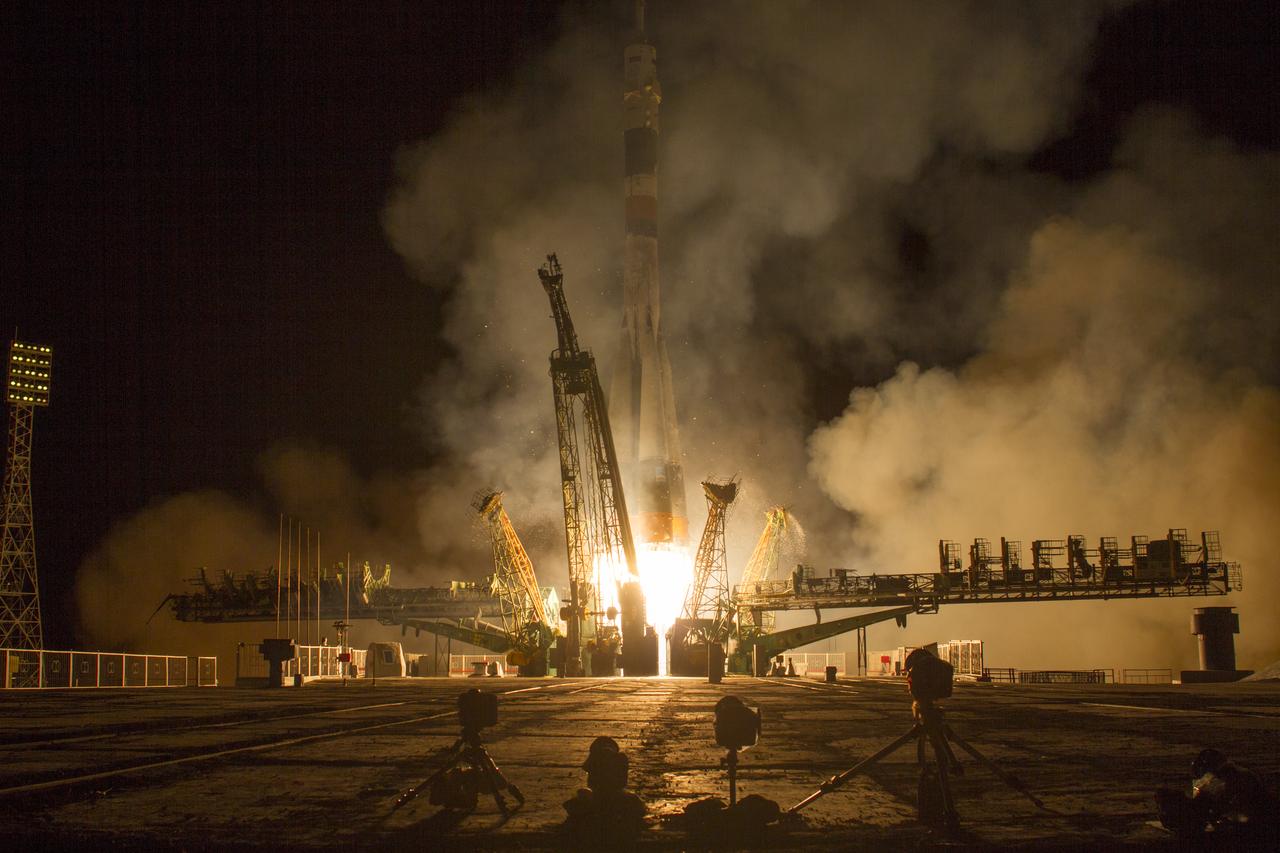 The Soyuz TMA-10M rocket launches from the Baikonur Cosmodrome in Kazakhstan on Thursday, Sept. 26, 2013 carrying Expedition 37 Soyuz Commander Oleg Kotov, NASA Flight Engineer Michael Hopkins and Russian Flight Engineer Sergey Ryazanskiy to the International Space Station.  Their Soyuz rocket launched at 2:58 a.m. local time.  Photo Credit: (NASA/Carla Cioffi)