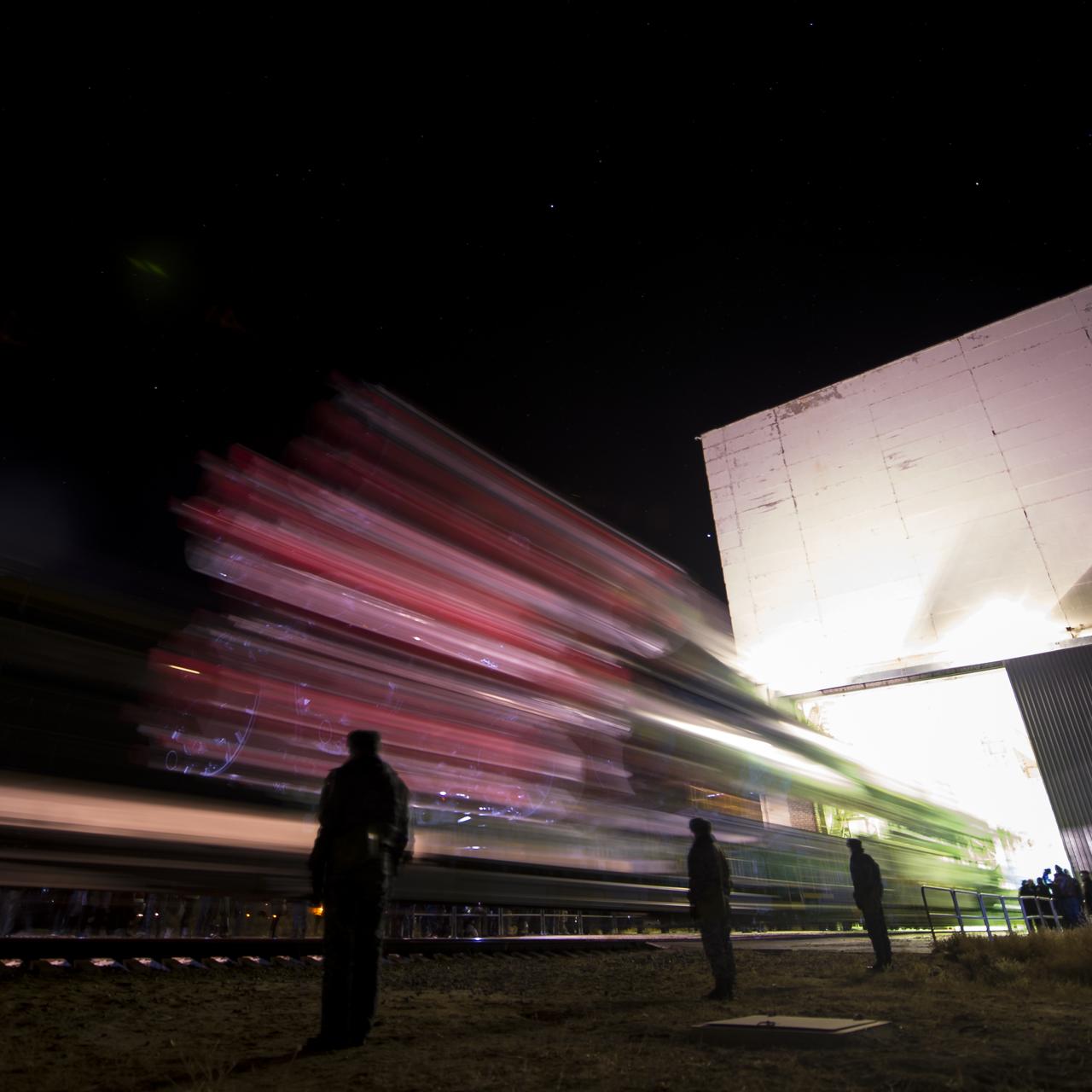 The Soyuz TMA-11M rocket is seen in this long exposure photograph as it is rolled out to the launch pad by train on Tuesday, Nov. 5, 2013, at the Baikonur Cosmodrome in Kazakhstan. Launch of the Soyuz rocket is scheduled for November 7 and will send Expedition 38 Soyuz Commander Mikhail Tyurin of Roscosmos, Flight Engineer Rick Mastracchio of NASA and Flight Engineer Koichi Wakata of the Japan Aerospace Exploration Agency on a six-month mission aboard the International Space Station.  Photo Credit: (NASA/Bill Ingalls)