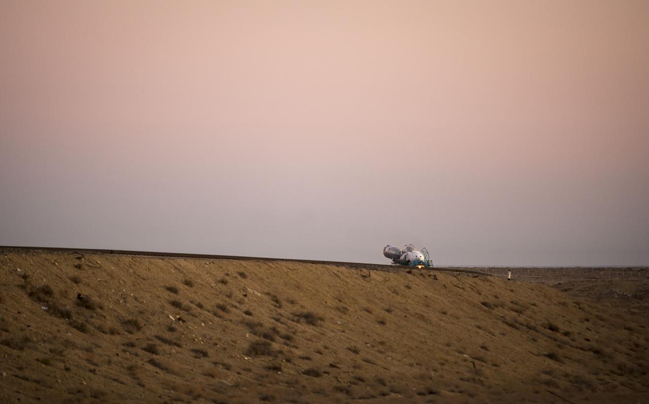 The Soyuz TMA-11M rocket is rolled out to the launch pad by train on Tuesday, Nov. 5, 2013, at the Baikonur Cosmodrome in Kazakhstan. Launch of the Soyuz rocket is scheduled for November 7 and will send Expedition 38 Soyuz Commander Mikhail Tyurin of Roscosmos, Flight Engineer Rick Mastracchio of NASA and Flight Engineer Koichi Wakata of the Japan Aerospace Exploration Agency on a six-month mission aboard the International Space Station.  Photo Credit: (NASA/Bill Ingalls)