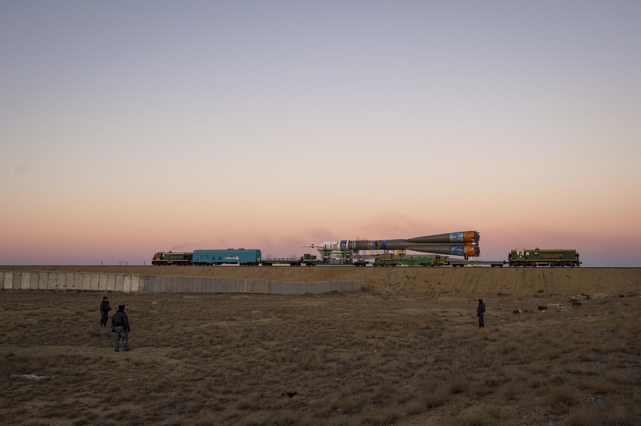 The Soyuz TMA-11M rocket, adorned with the logo of the Sochi Olympic Organizing Committee and other related artwork, is rolled out to the launch pad by train on Tuesday, Nov. 5, 2013, at the Baikonur Cosmodrome in Kazakhstan. Launch of the Soyuz rocket is scheduled for November 7 and will send Expedition 38 Soyuz Commander Mikhail Tyurin of Roscosmos, Flight Engineer Rick Mastracchio of NASA and Flight Engineer Koichi Wakata of the Japan Aerospace Exploration Agency on a six-month mission aboard the International Space Station.  Photo Credit: (NASA/Bill Ingalls)