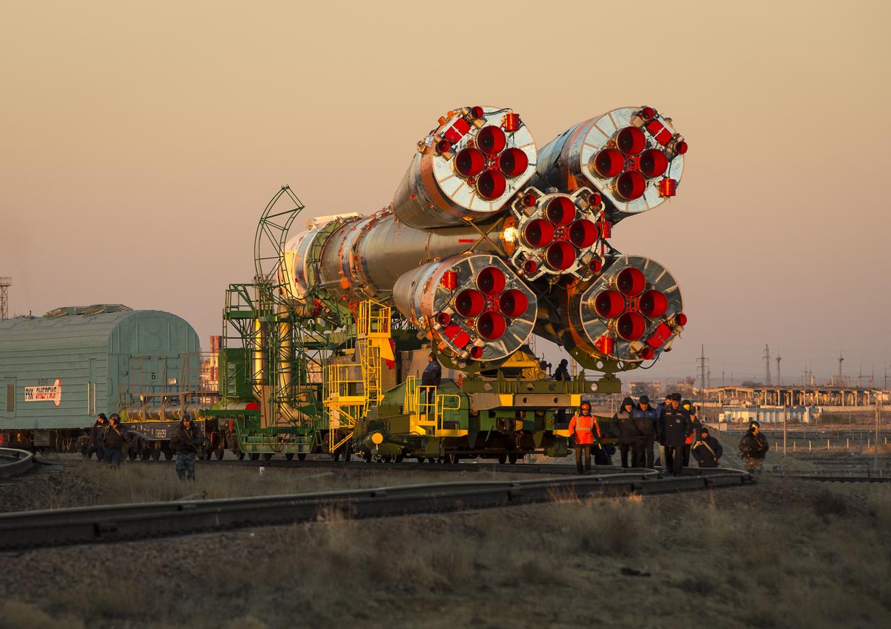 The Soyuz TMA-11M rocket is rolled out to the launch pad by train on Tuesday, Nov. 5, 2013, at the Baikonur Cosmodrome in Kazakhstan. Launch of the Soyuz rocket is scheduled for November 7 and will send Expedition 38 Soyuz Commander Mikhail Tyurin of Roscosmos, Flight Engineer Rick Mastracchio of NASA and Flight Engineer Koichi Wakata of the Japan Aerospace Exploration Agency on a six-month mission aboard the International Space Station.  Photo Credit: (NASA/Bill Ingalls)