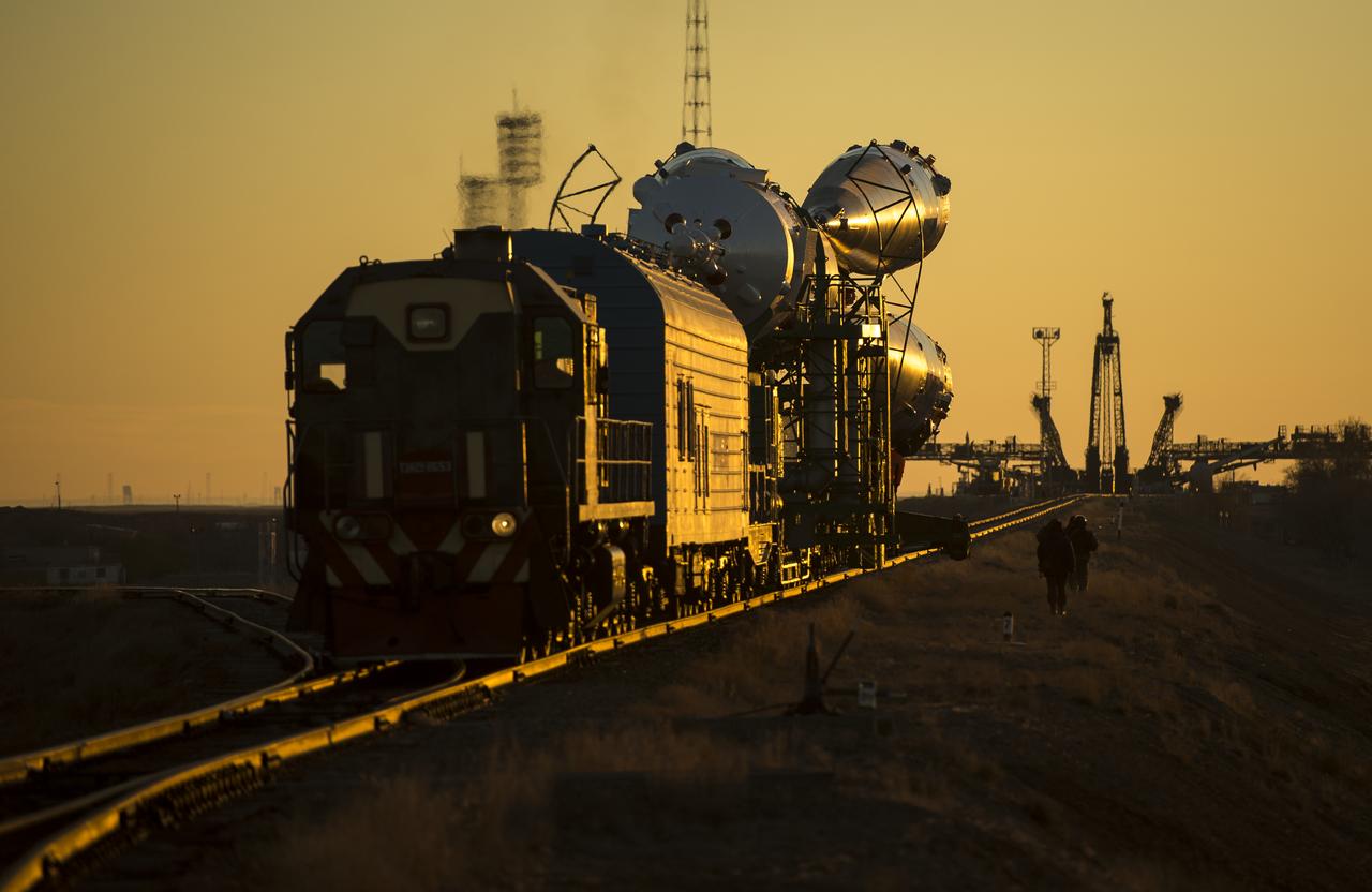 The Soyuz TMA-11M rocket is rolled out to the launch pad by train on Tuesday, Nov. 5, 2013, at the Baikonur Cosmodrome in Kazakhstan. Launch of the Soyuz rocket is scheduled for November 7 and will send Expedition 38 Soyuz Commander Mikhail Tyurin of Roscosmos, Flight Engineer Rick Mastracchio of NASA and Flight Engineer Koichi Wakata of the Japan Aerospace Exploration Agency on a six-month mission aboard the International Space Station.  Photo Credit: (NASA/Bill Ingalls)