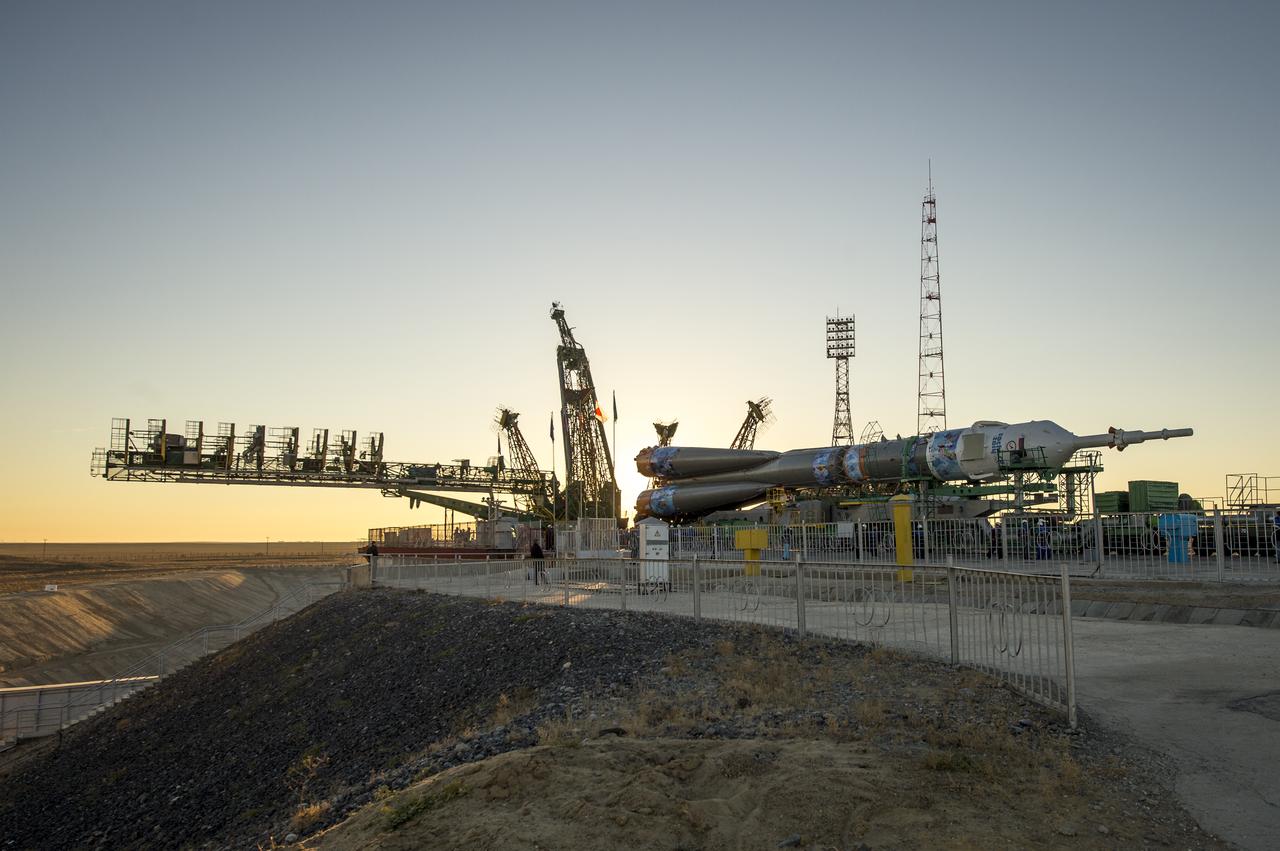 The Soyuz TMA-11M rocket, adorned with the logo of the Sochi Olympic Organizing Committee and other related artwork, arrives at the launch pad by train on Tuesday, Nov. 5, 2013, at the Baikonur Cosmodrome in Kazakhstan. Launch of the Soyuz rocket is scheduled for November 7 and will send Expedition 38 Soyuz Commander Mikhail Tyurin of Roscosmos, Flight Engineer Rick Mastracchio of NASA and Flight Engineer Koichi Wakata of the Japan Aerospace Exploration Agency on a six-month mission aboard the International Space Station.  Photo Credit: (NASA/Bill Ingalls)