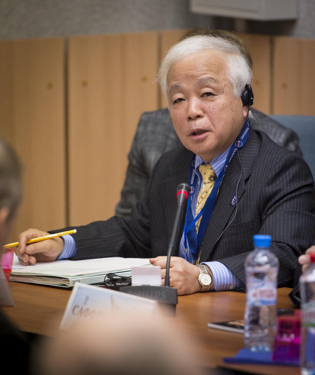 JAXA (Japan Aerospace Exploration Agency) President Naoki Okumura talks during the State Commission meeting to approve the Soyuz rocket launch of Expedition 38 Soyuz Commander Mikhail Tyurin of Roscosmos, Flight Engineer Koichi Wakata of the Japan Aerospace Exploration Agency, and, Flight Engineer Rick Mastracchio of NASA for a six month mission aboard the International Space Station, Wednesday, Nov. 6, 2013 at the Cosmonaut Hotel in Baikonur, Kazakhstan. Photo Credit: (NASA/Bill Ingalls)