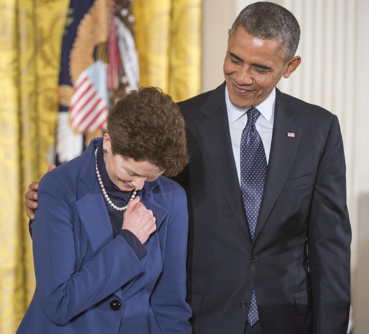 Tam O'Shaughnessy, Sally Ride's life partner and chair, board of directors of Sally Ride Science, is seen with President Barack Obama as she prepares to accept the Presidential Medal of Freedom on behalf of Dr. Ride, Wednesday, Nov. 20, 2013 at the White House in Washington.  Sally Ride, who was awarded the Medal of Freedom posthumously, was the first American female astronaut to travel to space. As a role model to generations of young women, she advocated passionately for science education, stood up for racial and gender equality in the classroom, and taught students from every background that there are no limits to what they can accomplish.  The Medal of Freedom is our Nation’s highest civilian honor, presented to individuals who have made especially meritorious contributions to the security or national interests of the United States, to world peace, or to cultural or other significant public or private endeavors.  Photo Credit: (NASA/Carla Cioffi)