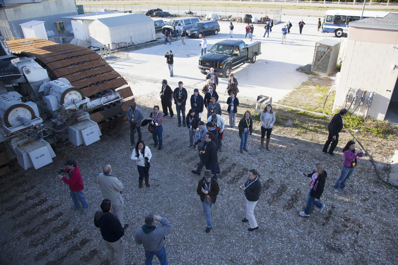 CAPE CANAVERAL, Fla. -- At NASA's Kennedy Space Center in Florida, social media participants were given an up-close look at one of the spaceport's mammoth crawler-transporters. Recent work has included preparations to install upgraded components that will enable the crawler to carry the greater loads anticipated with the agency's new rocket designed to take astronauts beyond low-Earth orbit for the first time since the early 1970s.  The social media participants gathered at the Florida spaceport for the launch of the Tracking and Data Relay Satellite, or TDRS-L spacecraft. Their visit included tours of key facilities and participating in presentations by key NASA leaders who updated the space agency's current efforts. Photo credit: NASA_Dan Casper