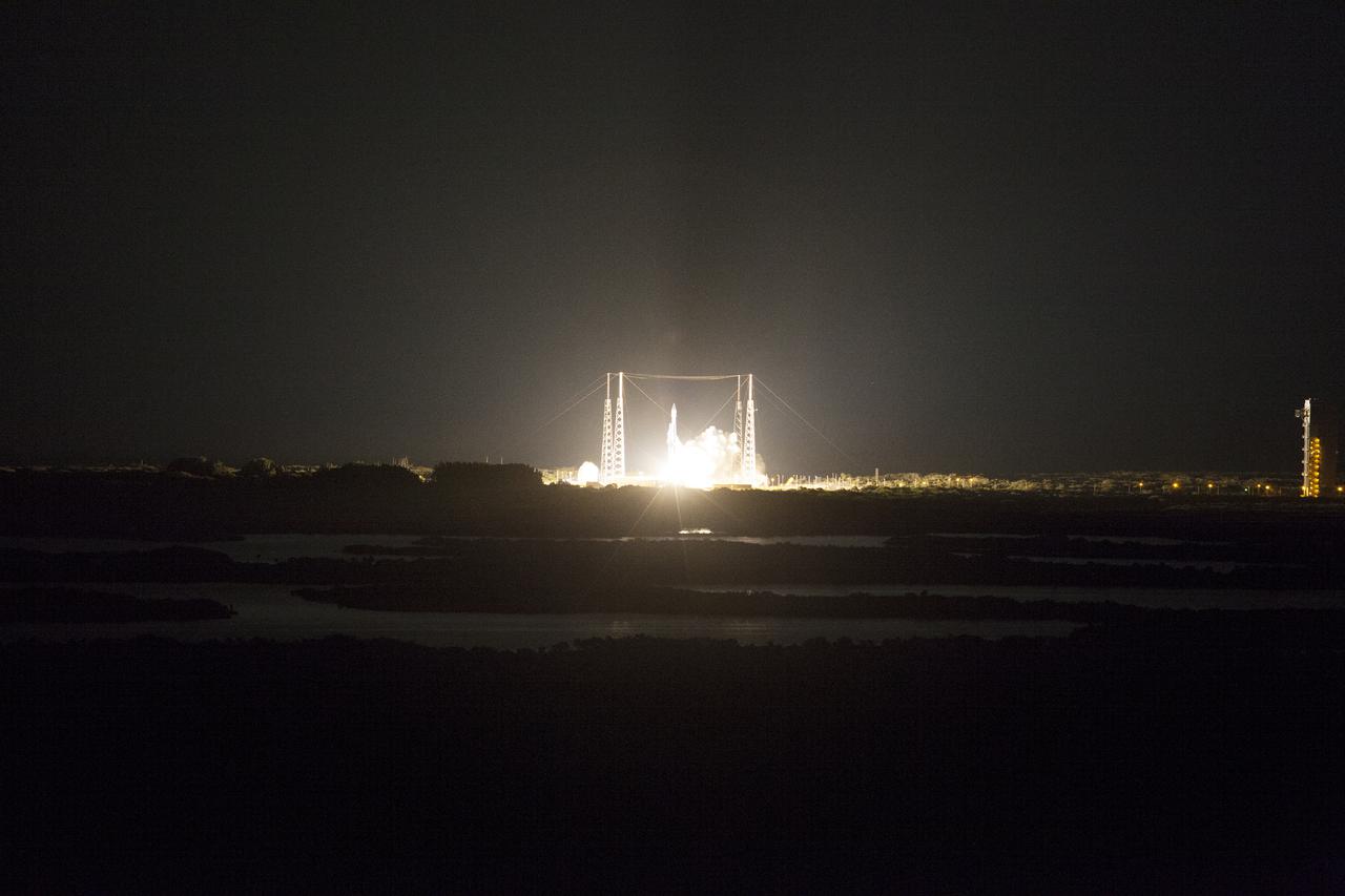 CAPE CANAVERAL, Fla. -- An exhaust plume forms at Space Launch Complex 41 on Cape Canaveral Air Force Station in Florida as the engines ignite under the United Launch Alliance Atlas V rocket carrying NASA's Tracking and Data Relay Satellite, or TDRS-L, to Earth orbit. Launch was at 9:33 p.m. EST Jan. 23 during a 40-minute launch window.  The TDRS-L spacecraft is the second of three new satellites designed to ensure vital operational continuity for NASA by expanding the lifespan of the Tracking and Data Relay Satellite System TDRSS fleet, which consists of eight satellites in geosynchronous orbit. The spacecraft provide tracking, telemetry, command and high-bandwidth data return services for numerous science and human exploration missions orbiting Earth. These include NASA's Hubble Space Telescope and the International Space Station. TDRS-L has a high-performance solar panel designed for more spacecraft power to meet the growing S-band communications requirements. TDRSS is one of three NASA Space Communication and Navigation SCaN networks providing space communications to NASA’s missions. For more information more about TDRS-L, visit http:__www.nasa.gov_tdrs. To learn more about SCaN, visit www.nasa.gov_scan.  Photo credit: NASA_Dan Casper