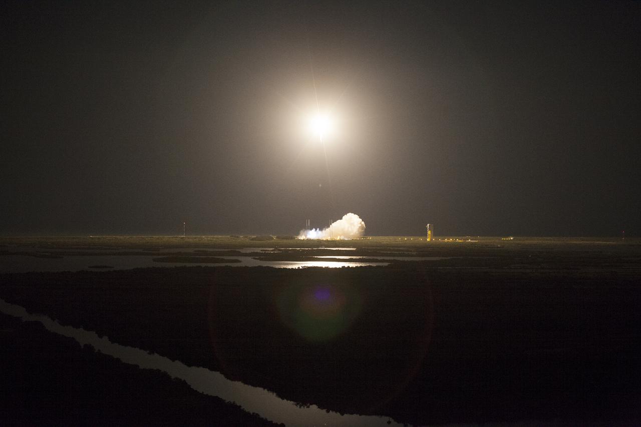CAPE CANAVERAL, Fla. -- A United Launch Alliance Atlas V rocket lights up the night sky over Space Launch Complex 41 at Cape Canaveral Air Force Station in Florida as it carries NASA's Tracking and Data Relay Satellite, or TDRS-L, to Earth orbit. Launch was at 9:33 p.m. EST Jan. 23 during a 40-minute launch window.  The TDRS-L spacecraft is the second of three new satellites designed to ensure vital operational continuity for NASA by expanding the lifespan of the Tracking and Data Relay Satellite System TDRSS fleet, which consists of eight satellites in geosynchronous orbit. The spacecraft provide tracking, telemetry, command and high-bandwidth data return services for numerous science and human exploration missions orbiting Earth. These include NASA's Hubble Space Telescope and the International Space Station. TDRS-L has a high-performance solar panel designed for more spacecraft power to meet the growing S-band communications requirements. TDRSS is one of three NASA Space Communication and Navigation SCaN networks providing space communications to NASA’s missions. For more information more about TDRS-L, visit http:__www.nasa.gov_tdrs. To learn more about SCaN, visit www.nasa.gov_scan.  Photo credit: NASA_Dan Casper