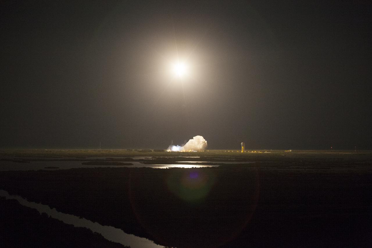 CAPE CANAVERAL, Fla. -- A United Launch Alliance Atlas V rocket streaks into the night from Space Launch Complex 41 at Cape Canaveral Air Force Station in Florida, carrying NASA's Tracking and Data Relay Satellite, or TDRS-L, to Earth orbit. Launch was at 9:33 p.m. EST Jan. 23 during a 40-minute launch window.  The TDRS-L spacecraft is the second of three new satellites designed to ensure vital operational continuity for NASA by expanding the lifespan of the Tracking and Data Relay Satellite System TDRSS fleet, which consists of eight satellites in geosynchronous orbit. The spacecraft provide tracking, telemetry, command and high-bandwidth data return services for numerous science and human exploration missions orbiting Earth. These include NASA's Hubble Space Telescope and the International Space Station. TDRS-L has a high-performance solar panel designed for more spacecraft power to meet the growing S-band communications requirements. TDRSS is one of three NASA Space Communication and Navigation SCaN networks providing space communications to NASA’s missions. For more information more about TDRS-L, visit http:__www.nasa.gov_tdrs. To learn more about SCaN, visit www.nasa.gov_scan.  Photo credit: NASA_Dan Casper