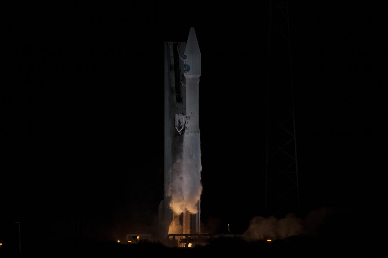CAPE CANAVERAL, Fla. -- The engines ignite under the United Launch Alliance Atlas V rocket, lifting NASA's Tracking and Data Relay Satellite, or TDRS-L, off Space Launch Complex 41 on Cape Canaveral Air Force Station in Florida. Launch was at 9:33 p.m. EST Jan. 23 during a 40-minute launch window. The TDRS-L spacecraft is the second of three new satellites designed to ensure vital operational continuity for NASA by expanding the lifespan of the Tracking and Data Relay Satellite System TDRSS fleet, which consists of eight satellites in geosynchronous orbit. The spacecraft provide tracking, telemetry, command and high-bandwidth data return services for numerous science and human exploration missions orbiting Earth. These include NASA's Hubble Space Telescope and the International Space Station. TDRS-L has a high-performance solar panel designed for more spacecraft power to meet the growing S-band communications requirements. TDRSS is one of three NASA Space Communication and Navigation SCaN networks providing space communications to NASA’s missions. For more information more about TDRS-L, visit http:__www.nasa.gov_tdrs. To learn more about SCaN, visit www.nasa.gov_scan. Photo credit: NASA_George Roberts