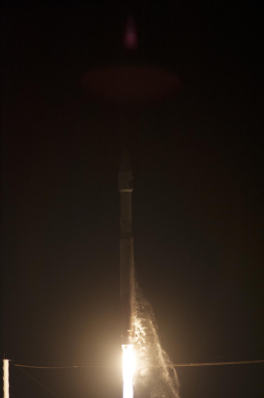 CAPE CANAVERAL, Fla. -- A United Launch Alliance Atlas V rocket streaks into the night from Space Launch Complex 41 at Cape Canaveral Air Force Station in Florida, carrying NASA's Tracking and Data Relay Satellite, or TDRS-L, to Earth orbit. Launch was at 9:33 p.m. EST Jan. 23 during a 40-minute launch window. The TDRS-L spacecraft is the second of three new satellites designed to ensure vital operational continuity for NASA by expanding the lifespan of the Tracking and Data Relay Satellite System TDRSS fleet, which consists of eight satellites in geosynchronous orbit. The spacecraft provide tracking, telemetry, command and high-bandwidth data return services for numerous science and human exploration missions orbiting Earth. These include NASA's Hubble Space Telescope and the International Space Station. TDRS-L has a high-performance solar panel designed for more spacecraft power to meet the growing S-band communications requirements. TDRSS is one of three NASA Space Communication and Navigation SCaN networks providing space communications to NASA’s missions. For more information more about TDRS-L, visit http:__www.nasa.gov_tdrs. To learn more about SCaN, visit www.nasa.gov_scan. Photo credit: NASA_Kevin O'Connell