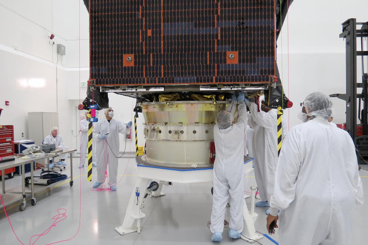 CAPE CANAVERAL, Fla. – Inside the Astrotech payload processing facility in Titusville, engineers and technicians place NASA's Tracking and Data Relay Satellite, or TDRS-L, spacecraft to an Atlas V payload adaptor in preparation for launch. The TDRS-L spacecraft is the second of three new satellites designed to ensure vital operational continuity for NASA by expanding the lifespan of the Tracking and Data Relay Satellite System TDRSS fleet, which consists of eight satellites in geosynchronous orbit. The spacecraft provide tracking, telemetry, command and high bandwidth data return services for numerous science and human exploration missions orbiting Earth. These include NASA's Hubble Space Telescope and the International Space Station. TDRS-L has a high-performance solar panel designed for more spacecraft power to meet the growing S-band communications requirements. TDRSS is one of NASA Space Communication and Navigation’s SCaN three networks providing space communications to NASA’s missions. For more information more about TDRS-L, visit: http:__www.nasa.gov_tdrs To learn more about SCaN, visit: www.nasa.gov_scan Photo credit: Boeing