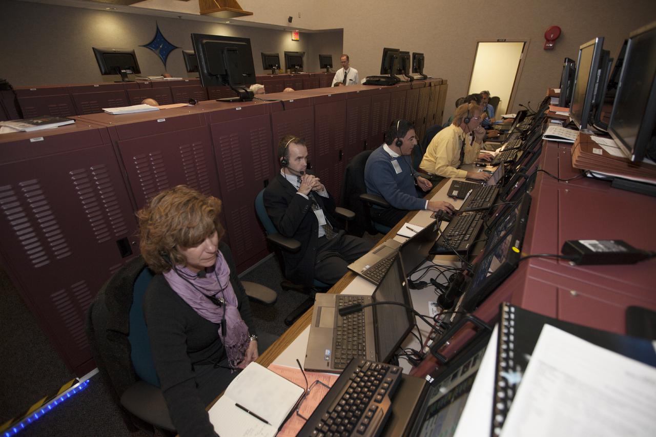 CAPE CANAVERAL, Fla. – In the Hangar AE Launch Vehicle Data Center at Cape Canaveral Air Force Station in Florida, NASA and contractor managers and engineers monitor progress of the countdown for the launch the agency's Tracking and Data Relay Satellite, or TDRS-L, spacecraft atop a United Launch Alliance Atlas V rocket.   The TDRS-L spacecraft is the second of three new satellites designed to ensure vital operational continuity for NASA by expanding the lifespan of the Tracking and Data Relay Satellite System TDRSS fleet, which consists of eight satellites in geosynchronous orbit. The spacecraft provide tracking, telemetry, command and high bandwidth data return services for numerous science and human exploration missions orbiting Earth. These include NASA's Hubble Space Telescope and the International Space Station. TDRS-L has a high-performance solar panel designed for more spacecraft power to meet the growing S-band communications requirements. TDRSS is one of NASA Space Communication and Navigation’s SCaN three networks providing space communications to NASA’s missions. For more information more about TDRS-L, visit: http:__www.nasa.gov_tdrs To learn more about SCaN, visit: www.nasa.gov_scan Photo credit: NASA_Kim Shiflett